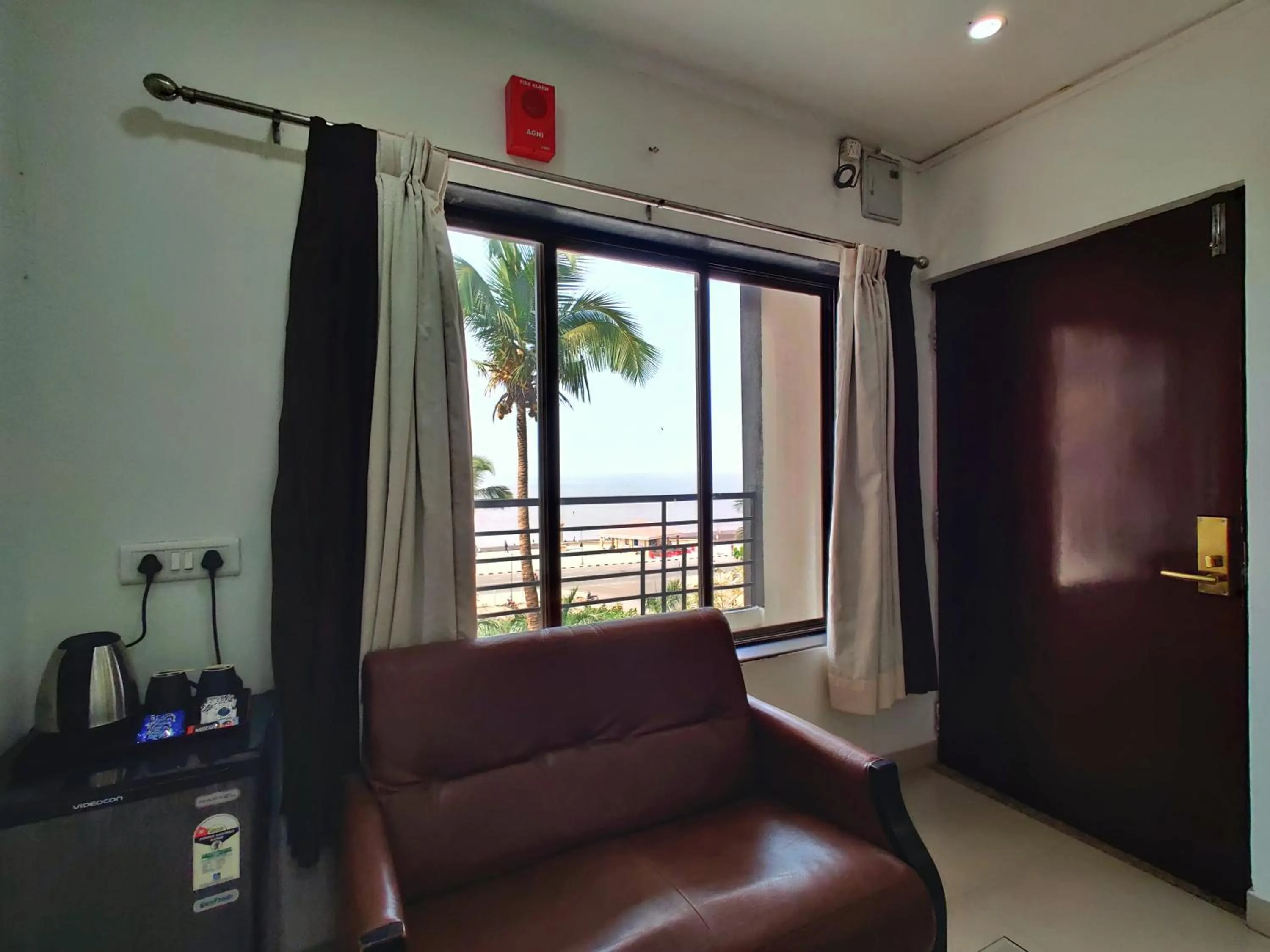 Seating area in Golden Chariot Hotel Daman