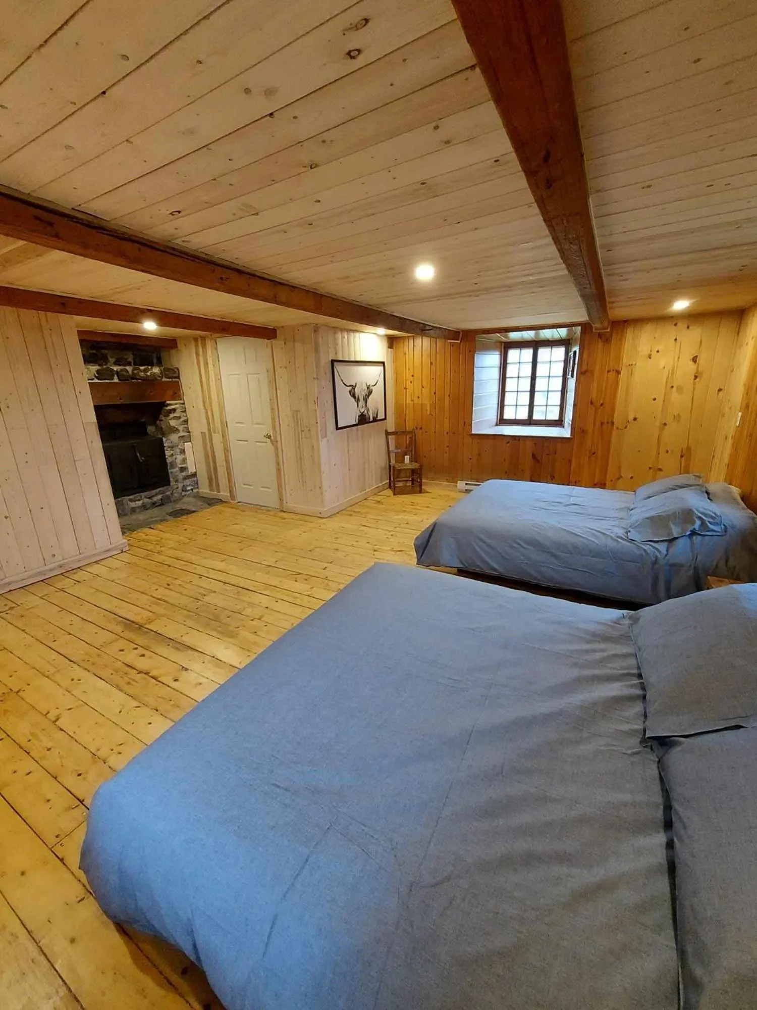 Bed in Auberge Le P'tit Bonheur