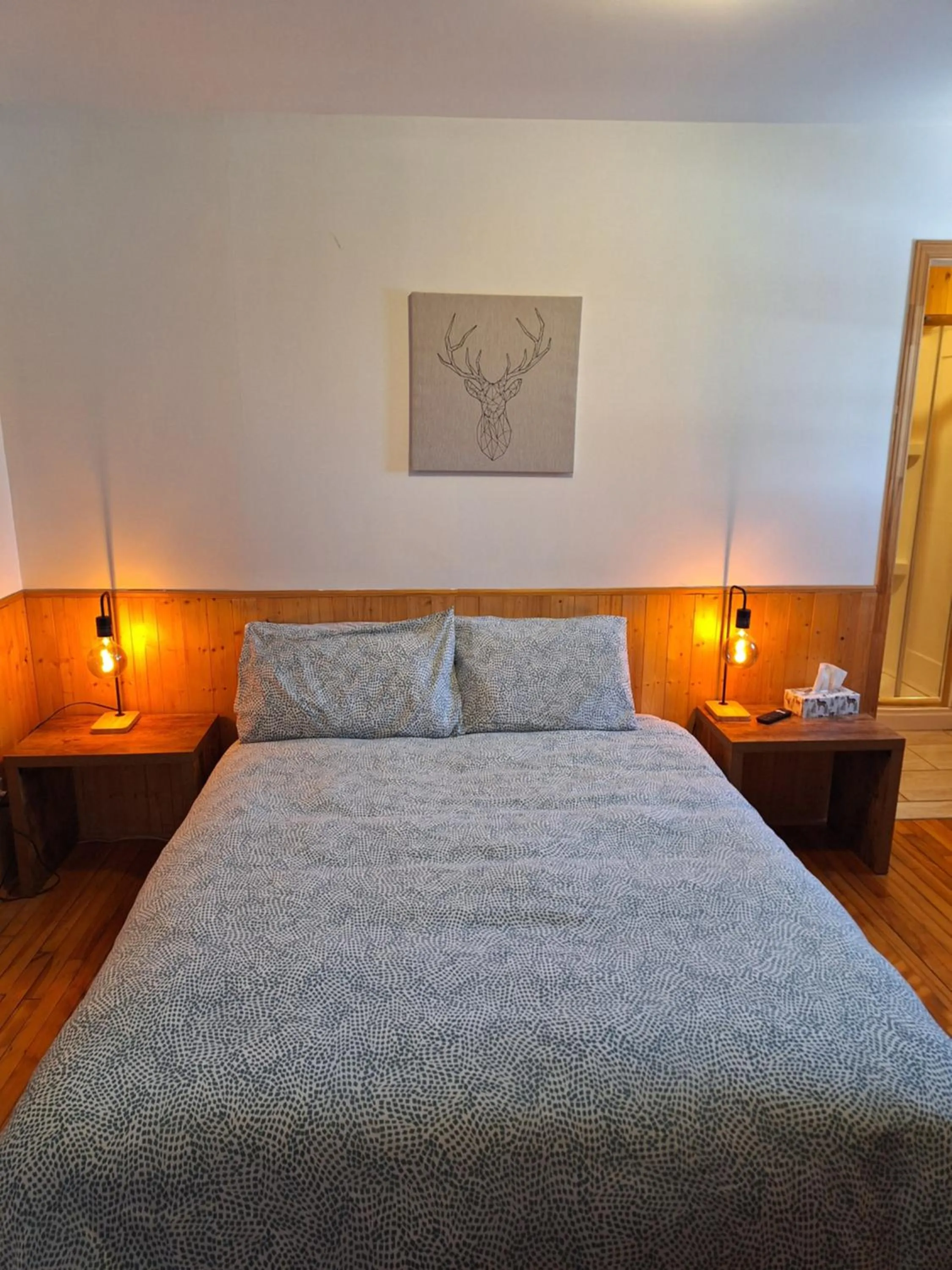 Bed in Auberge Le P'tit Bonheur