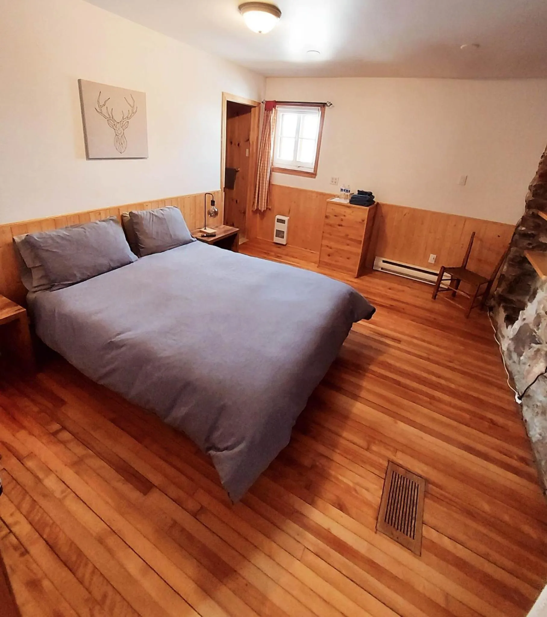 Bed in Auberge Le P'tit Bonheur