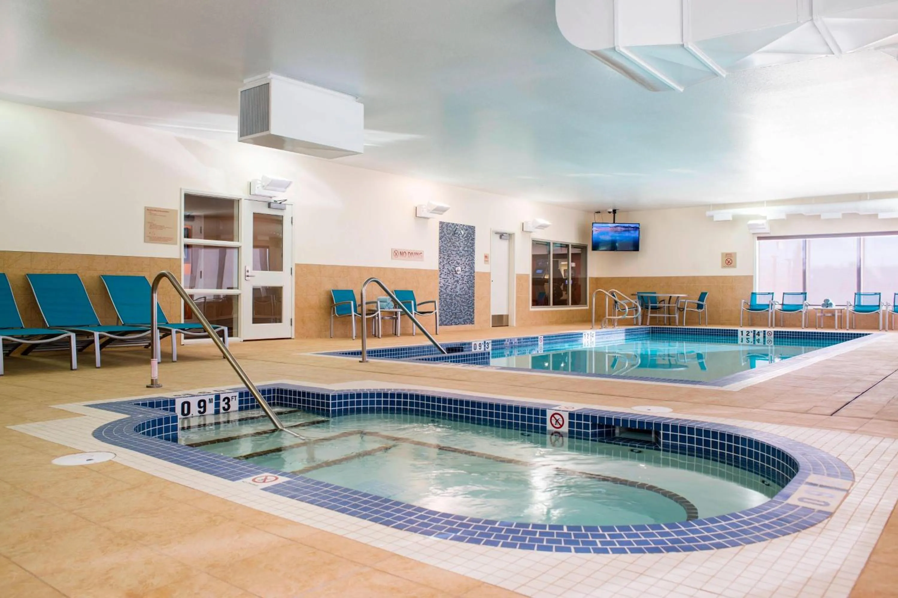 Swimming pool in TownePlace Suites by Marriott Red Deer