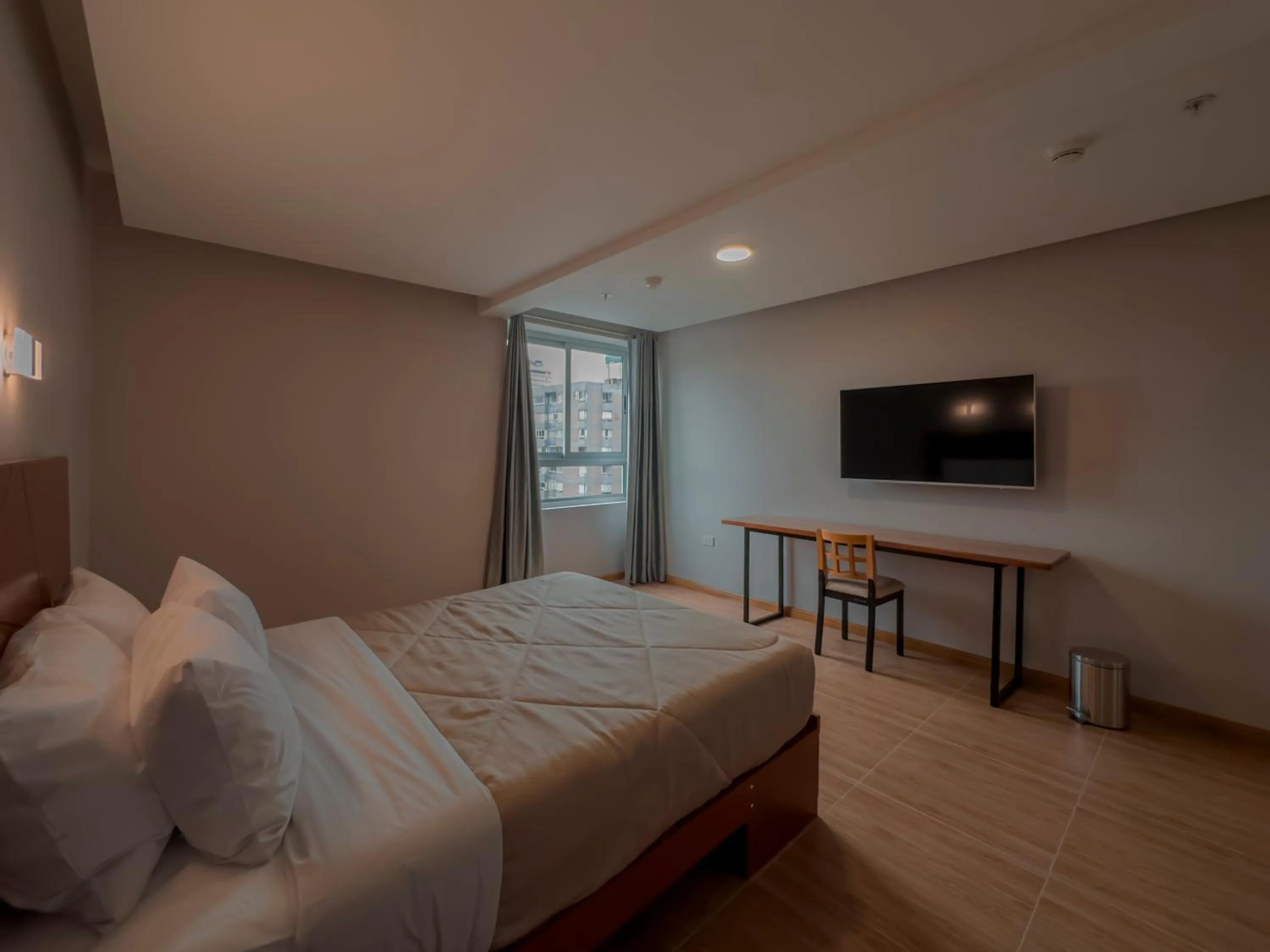 Bed in MIRAFLORES CITY HOTEL