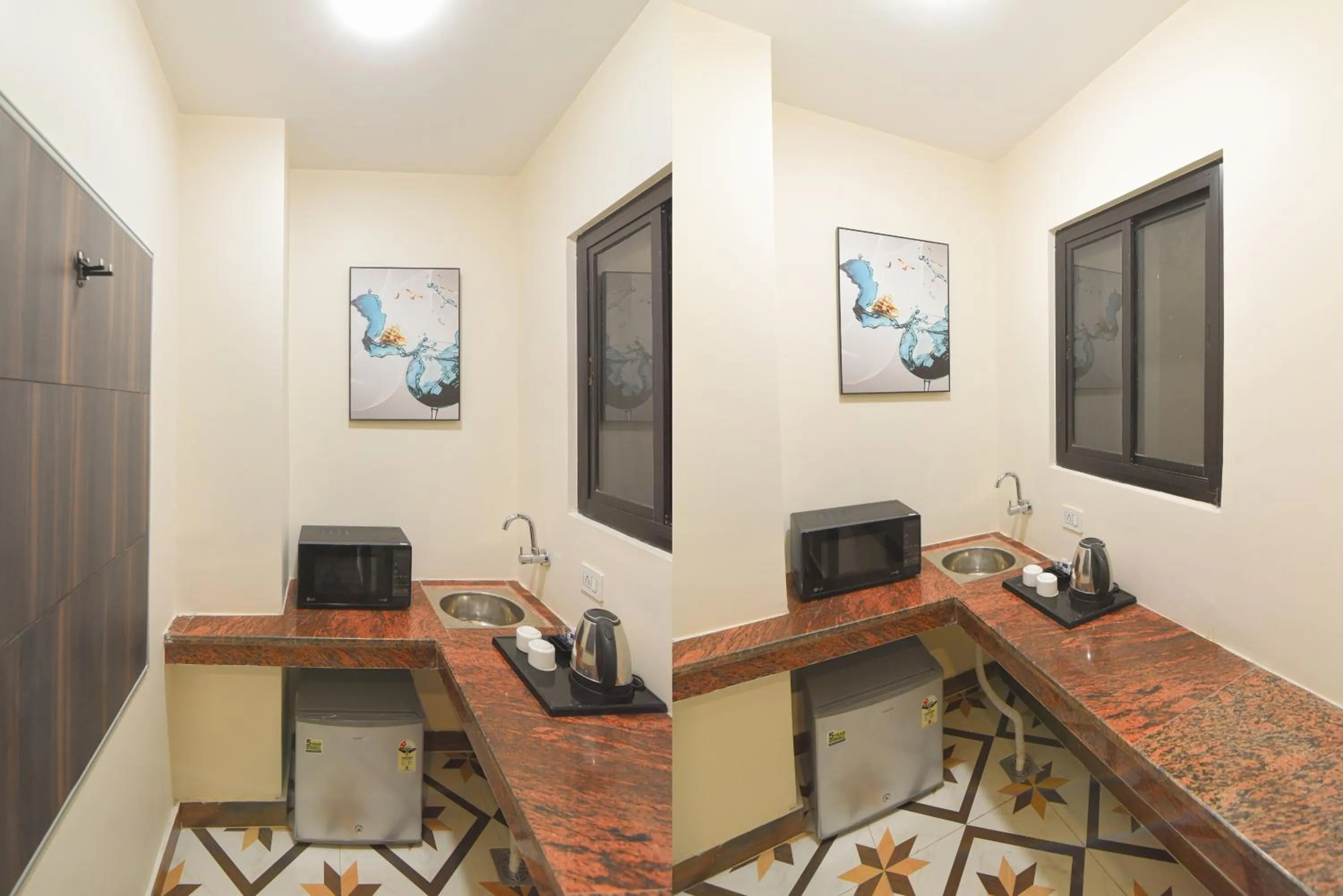 Kitchen or kitchenette in Hotel Swagat Suites