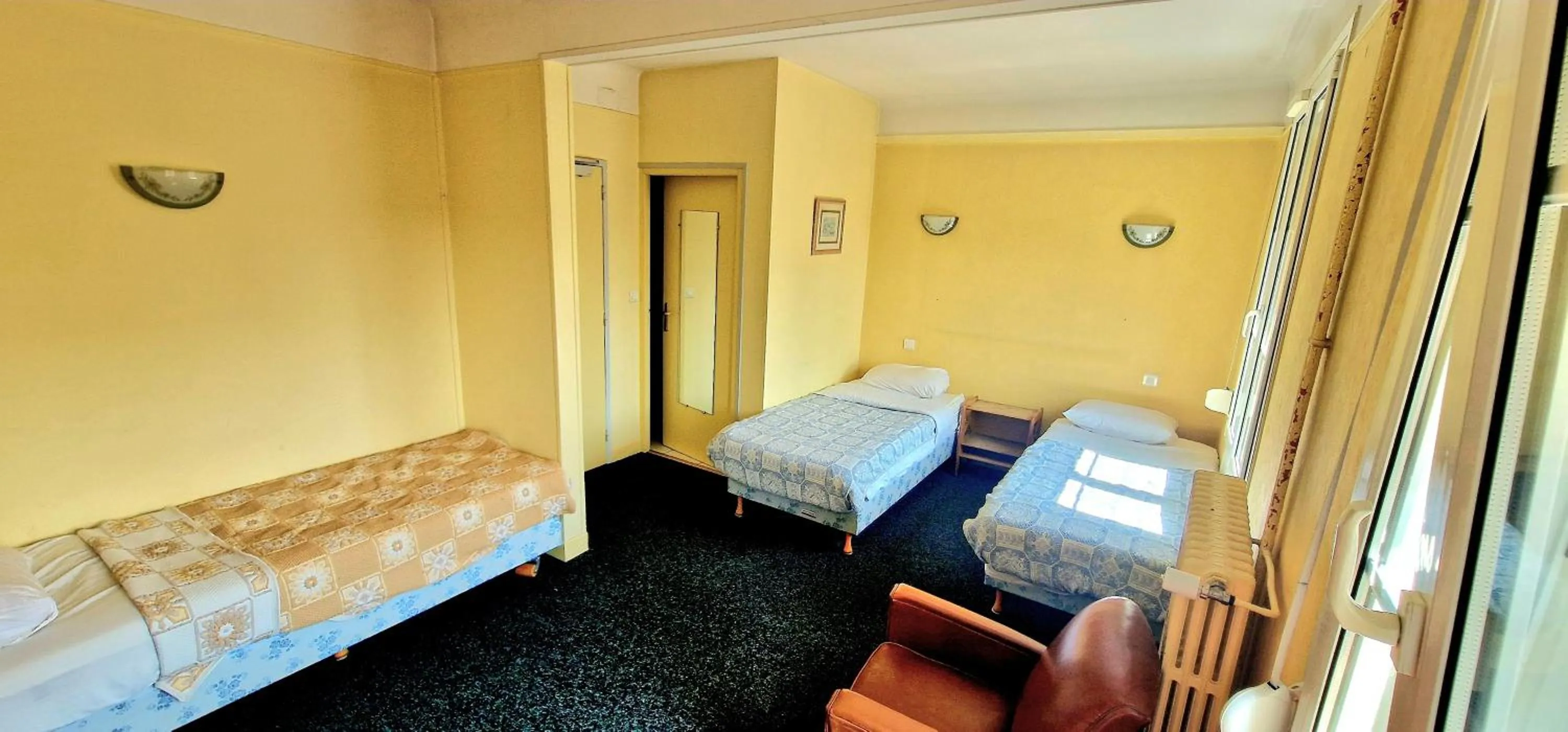 Bed in Hôtel de la cloche