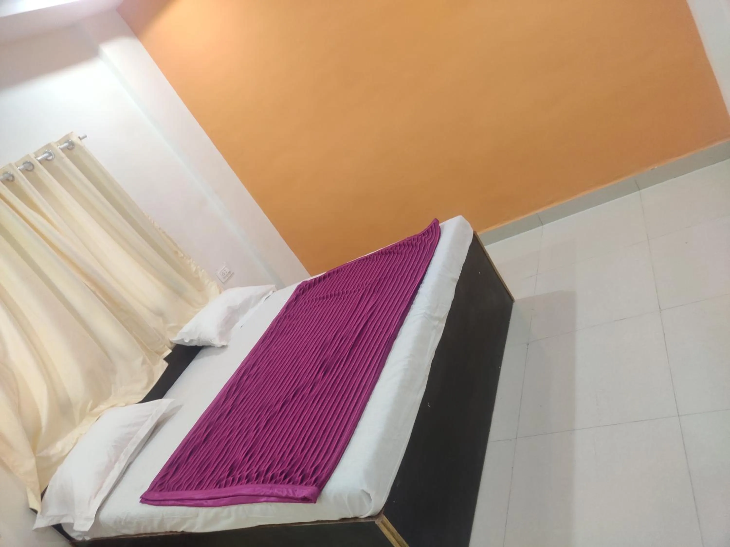 Bed in Hotel Sai Santosh