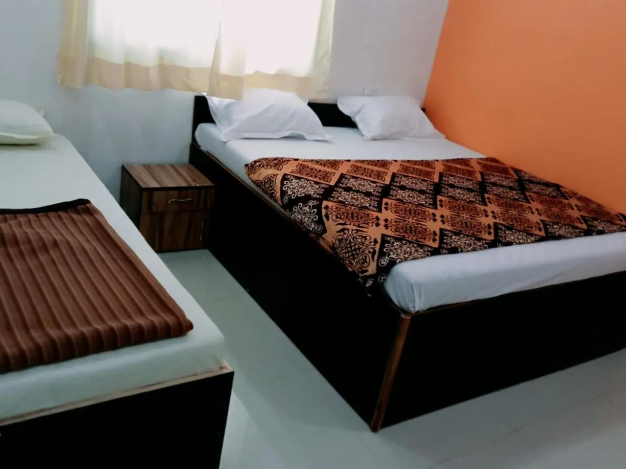 Bed in Hotel Sai Santosh