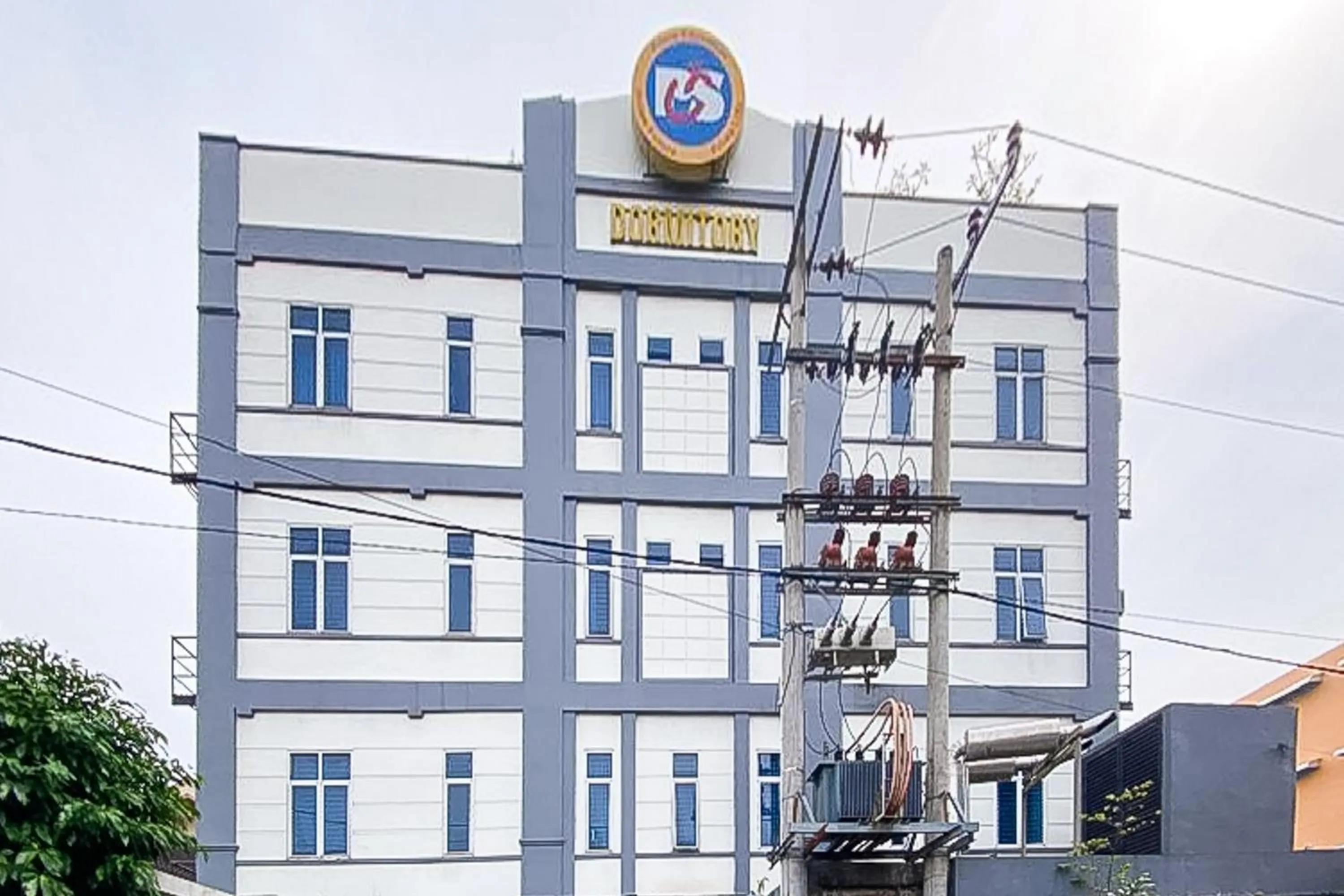 Facade/entrance in RedDoorz Hostel at FInest Medan