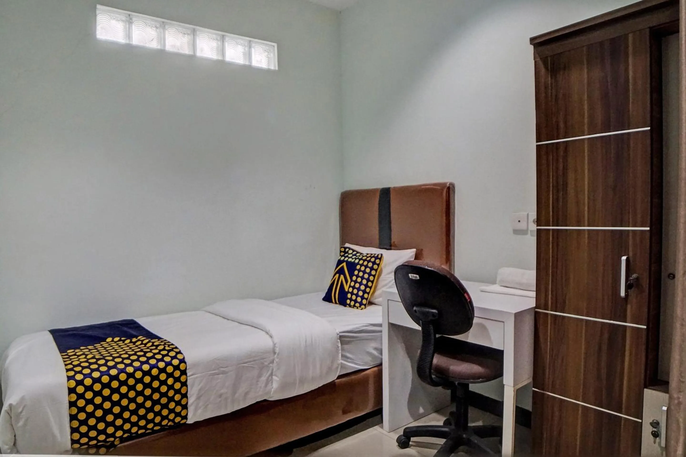 Bedroom in Hotel O Finest House Near Amplas Bus Terminal