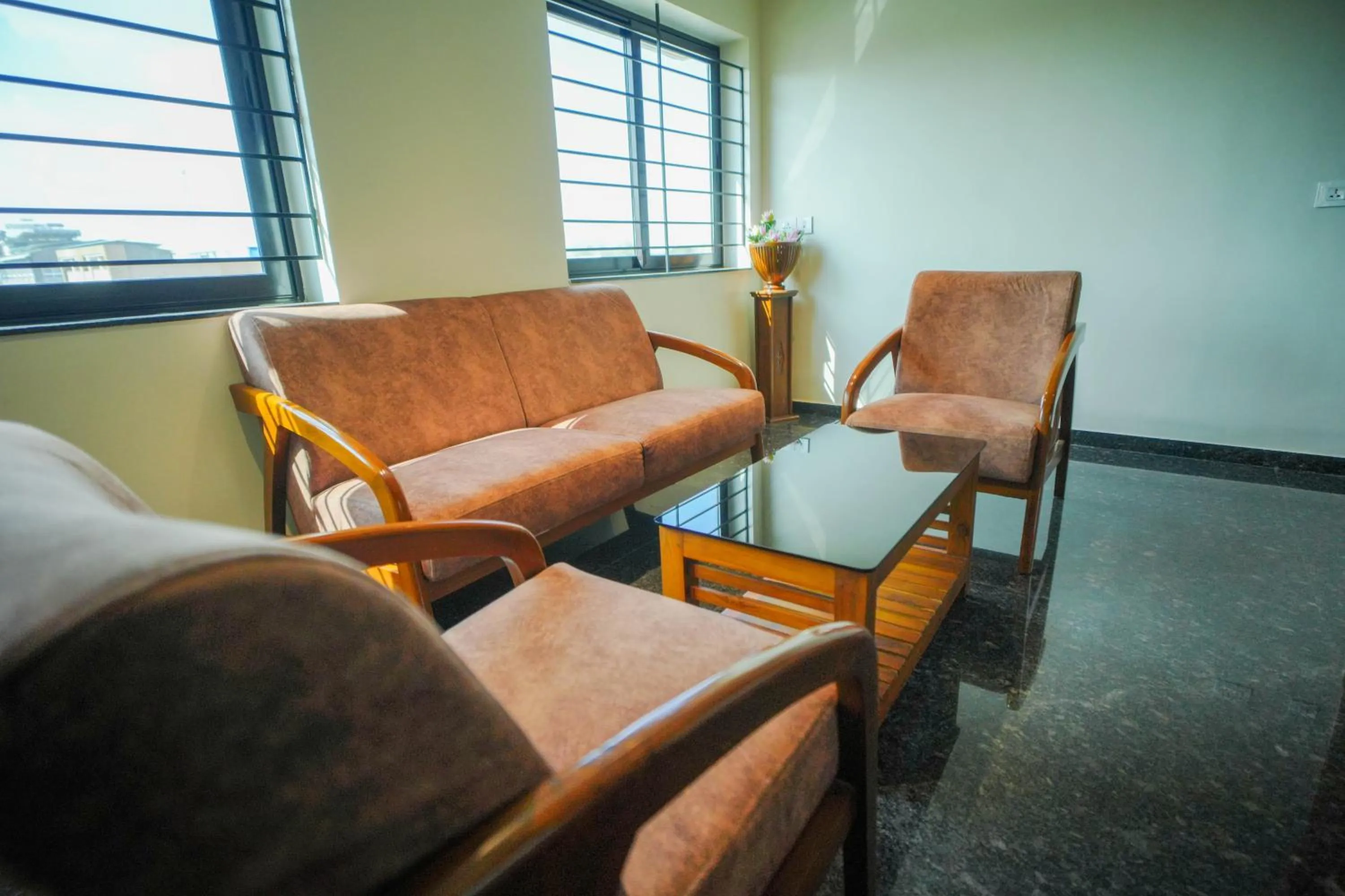 Seating area in Hotel Grand Sabarees