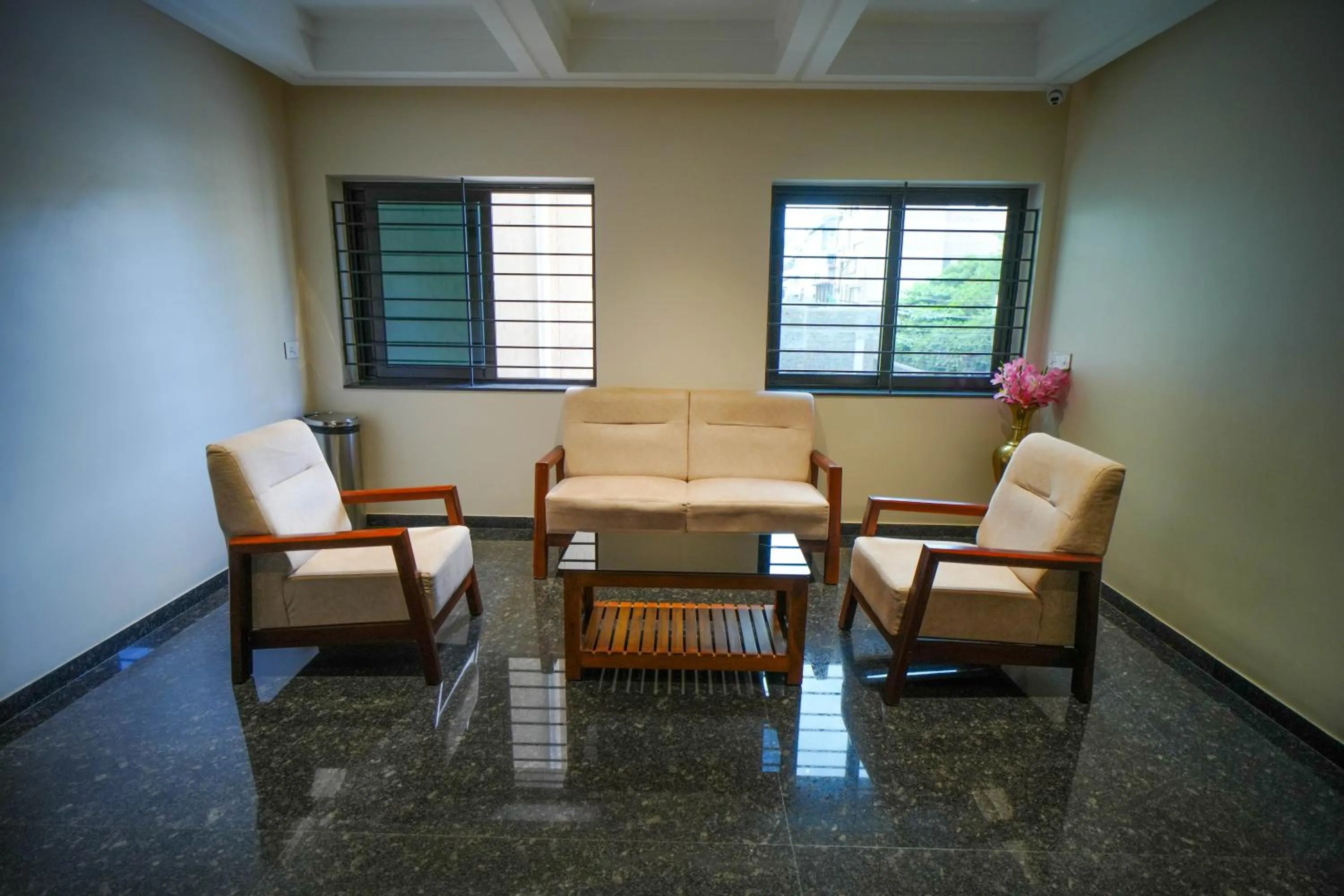 Seating area in Hotel Grand Sabarees