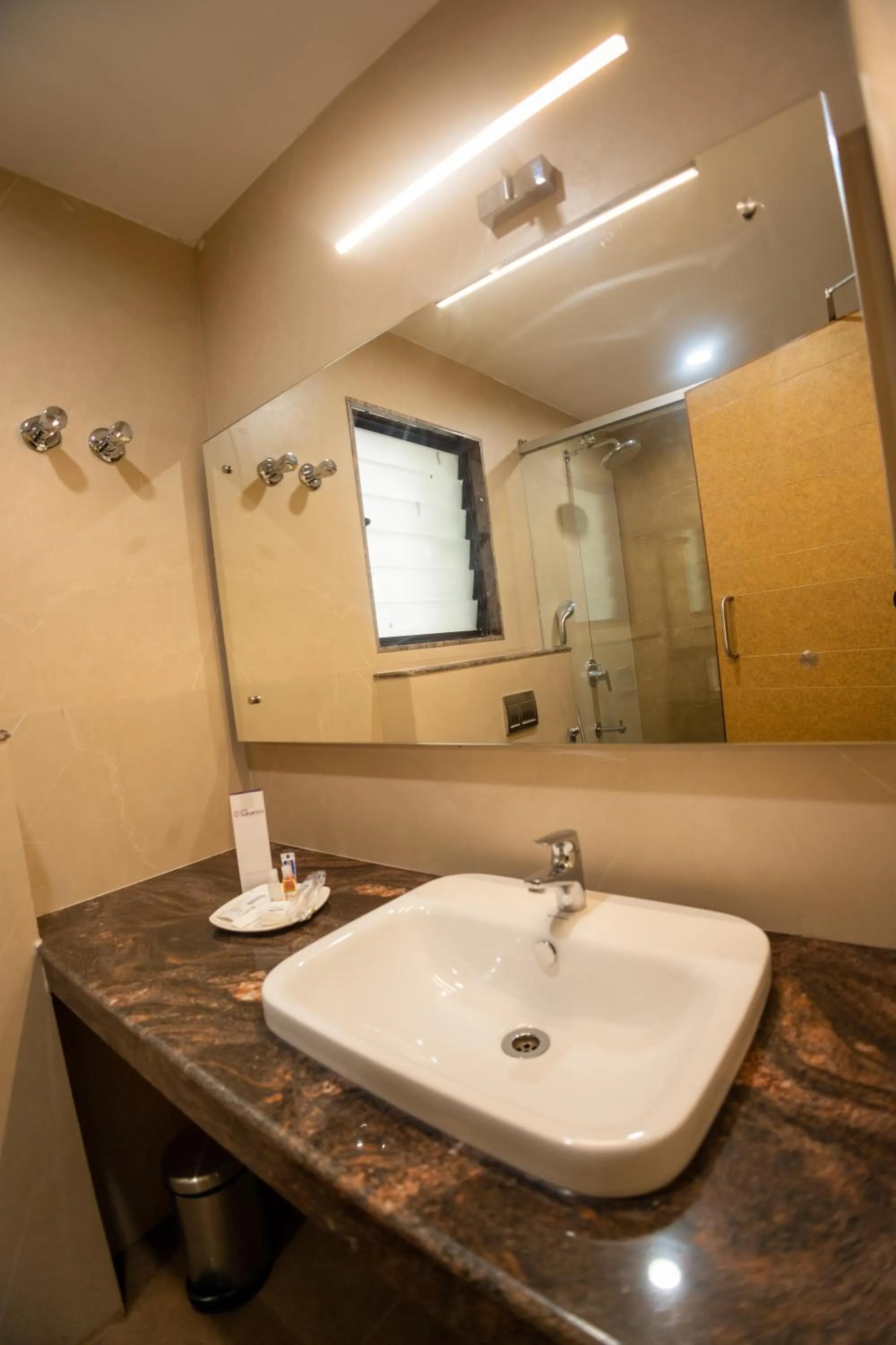 Bathroom in Hotel Grand Sabarees