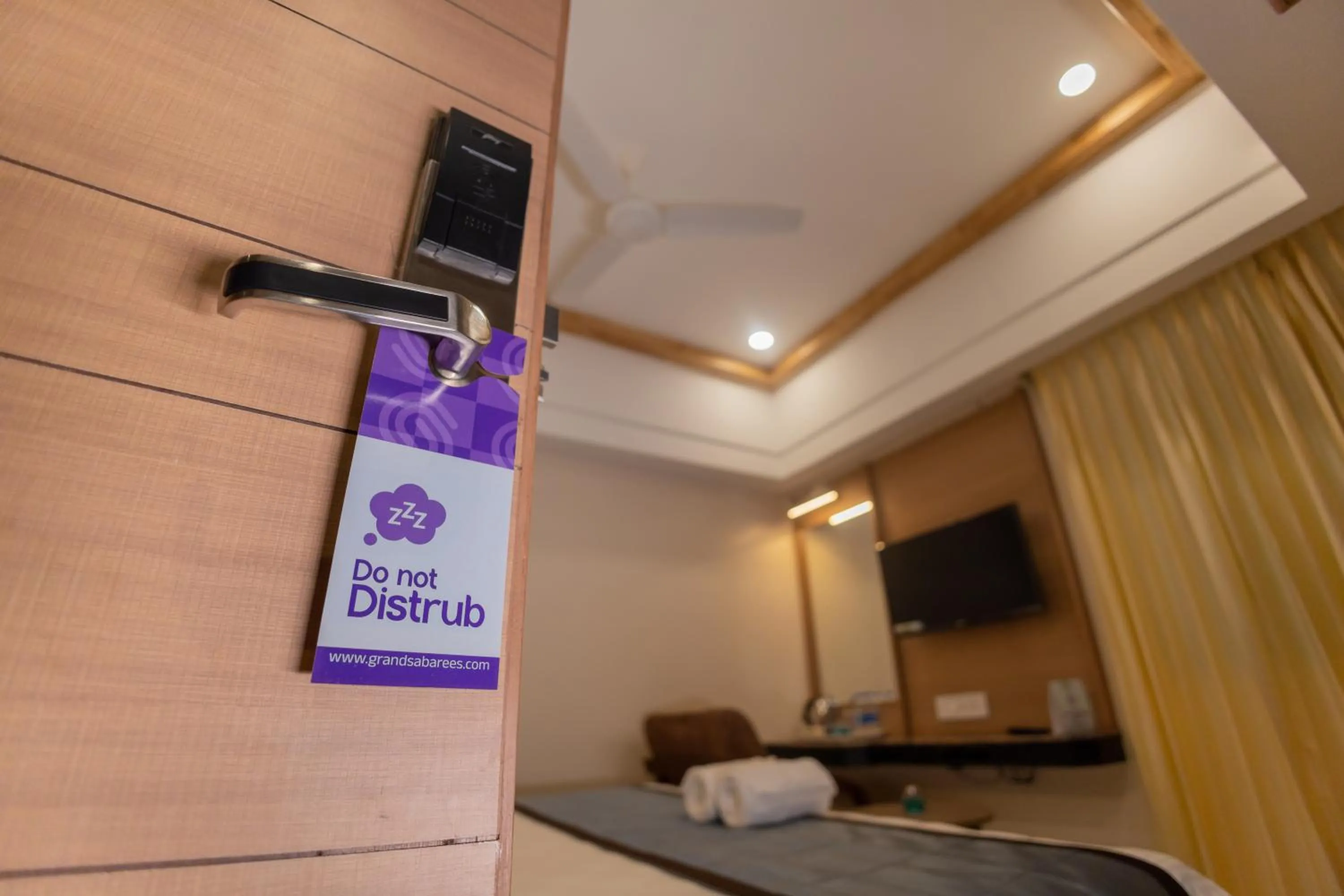 Facade/entrance, Bed in Hotel Grand Sabarees