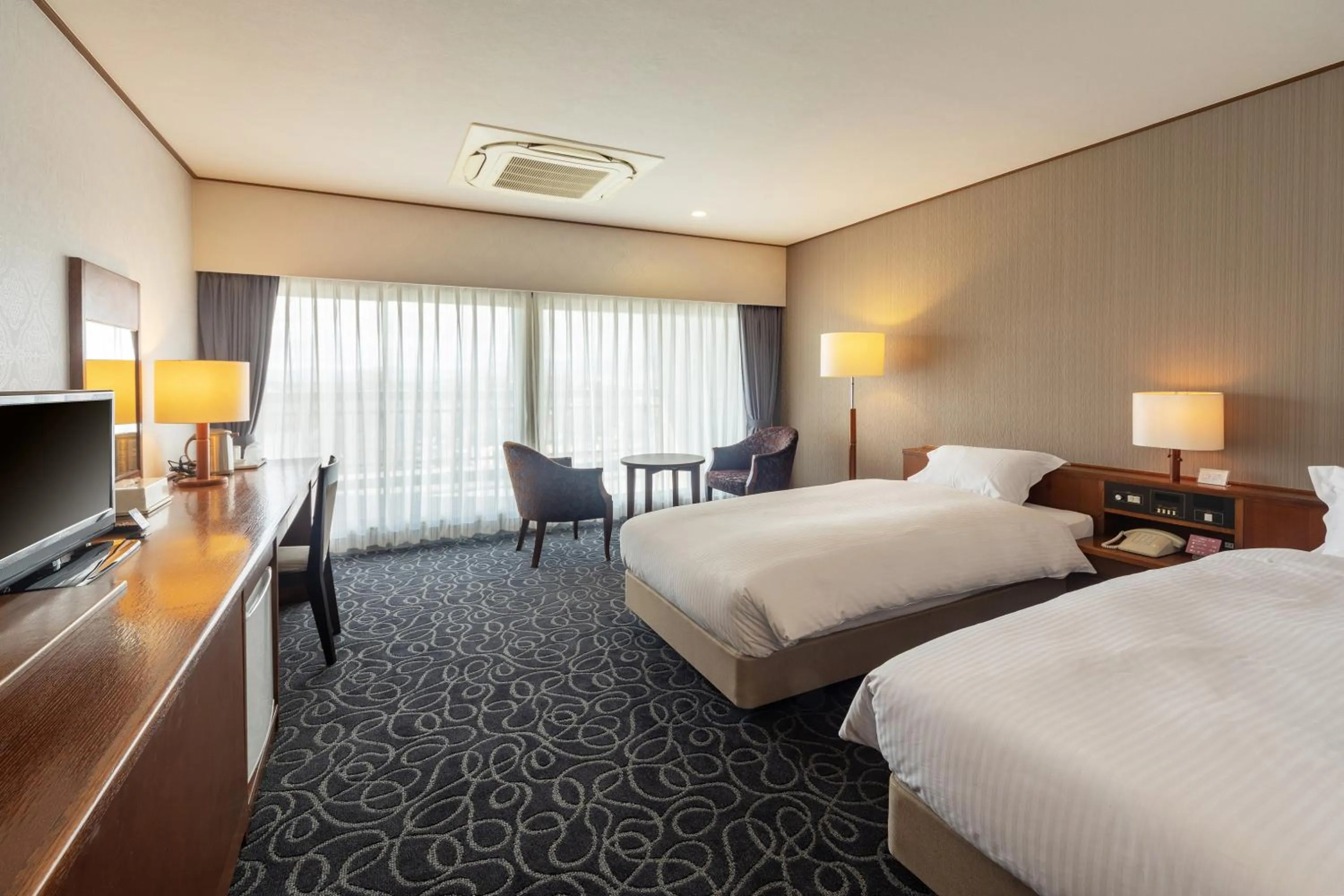 Bed in Suikouen Hotel