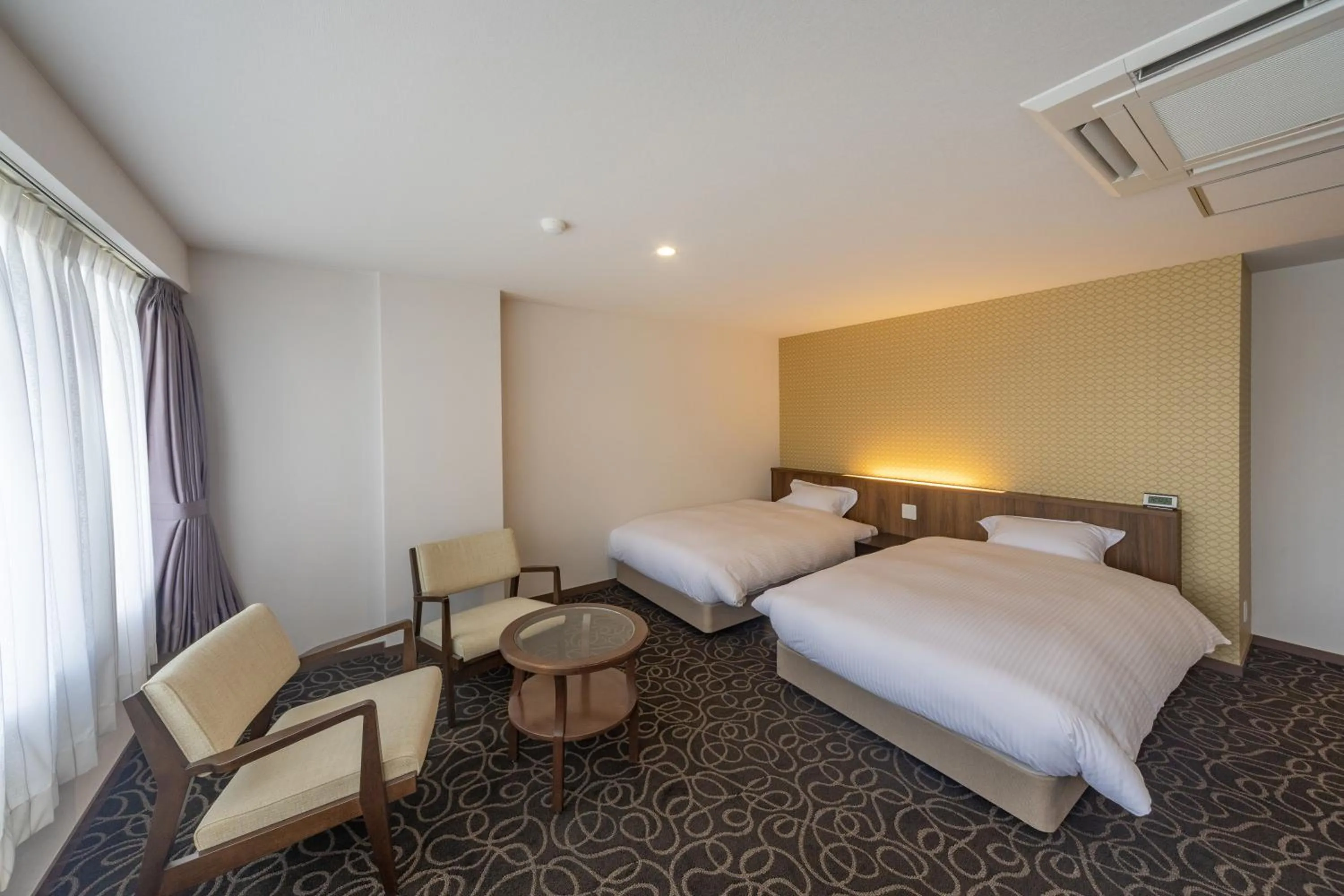 Bed in Suikouen Hotel