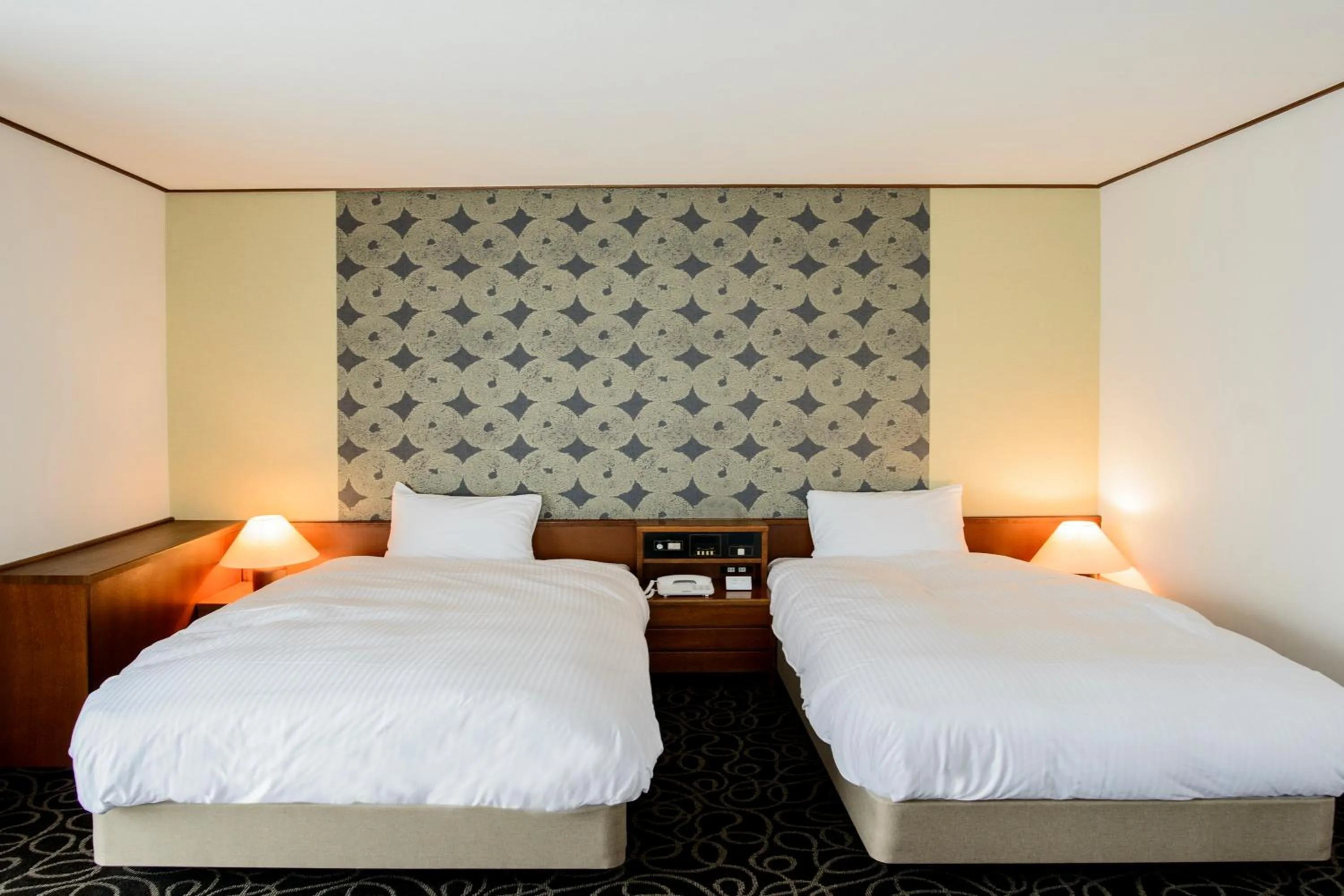 Bed in Suikouen Hotel