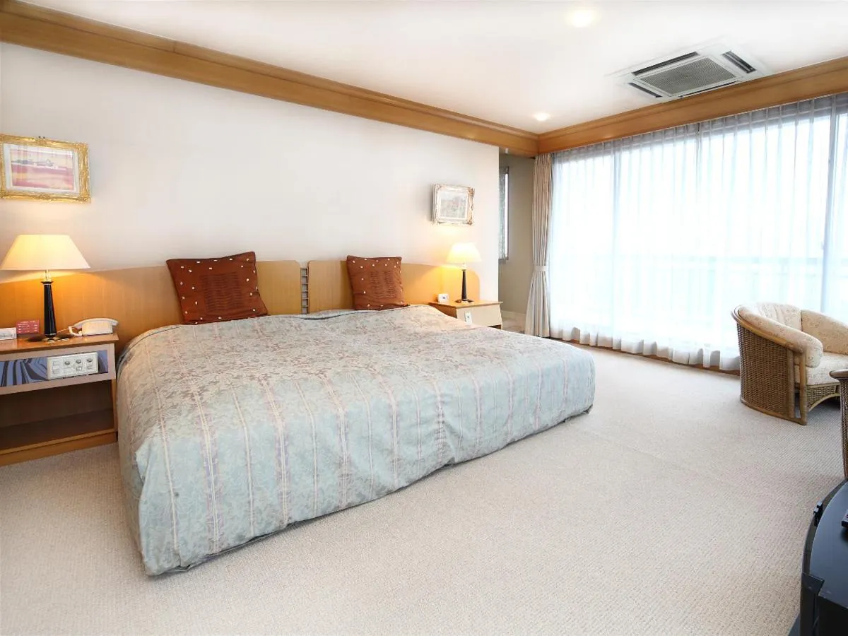 Bed in Suikouen Hotel