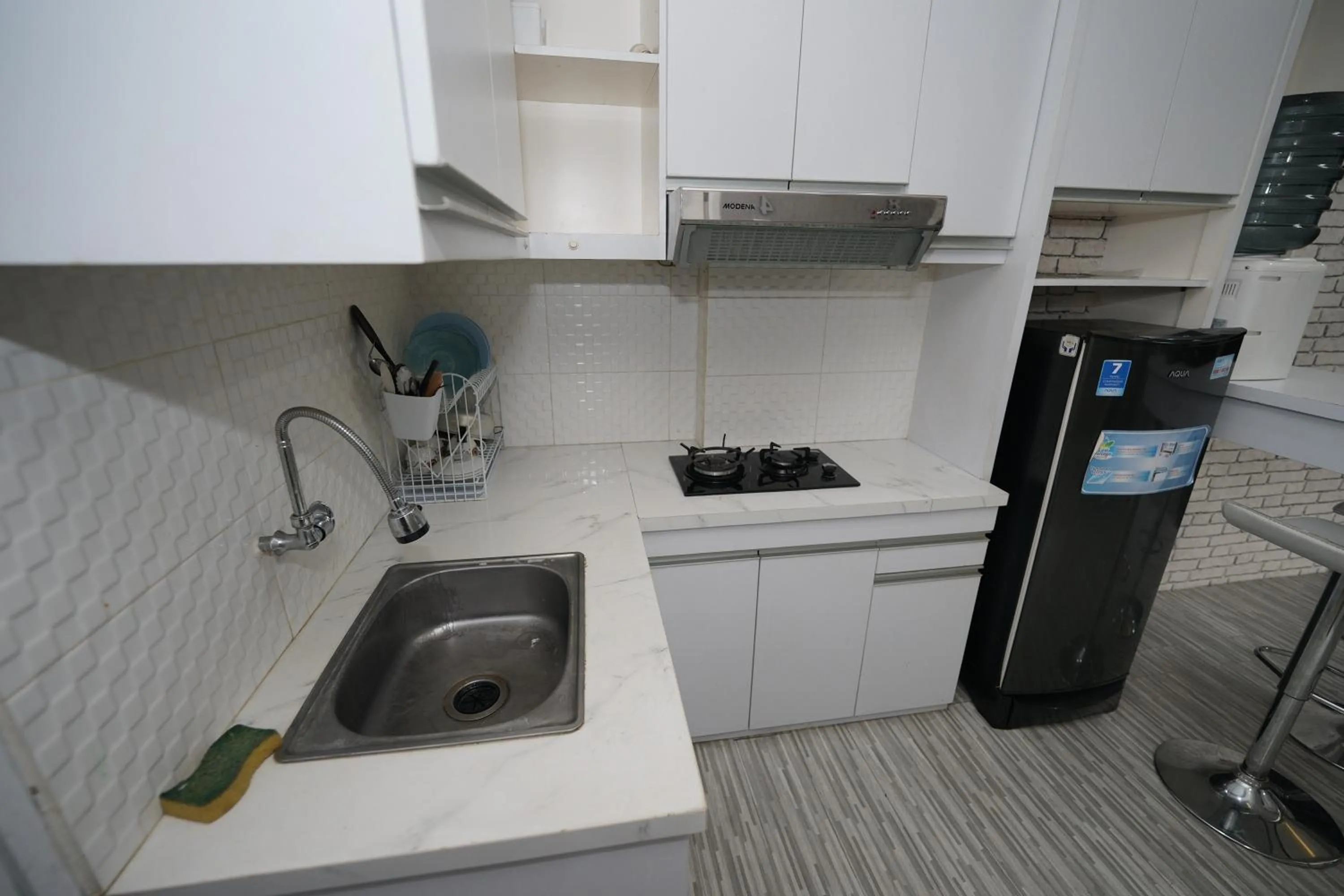 Kitchen or kitchenette in Perfect Stay Apartement The Suites Metro Bandung By Sultan Property