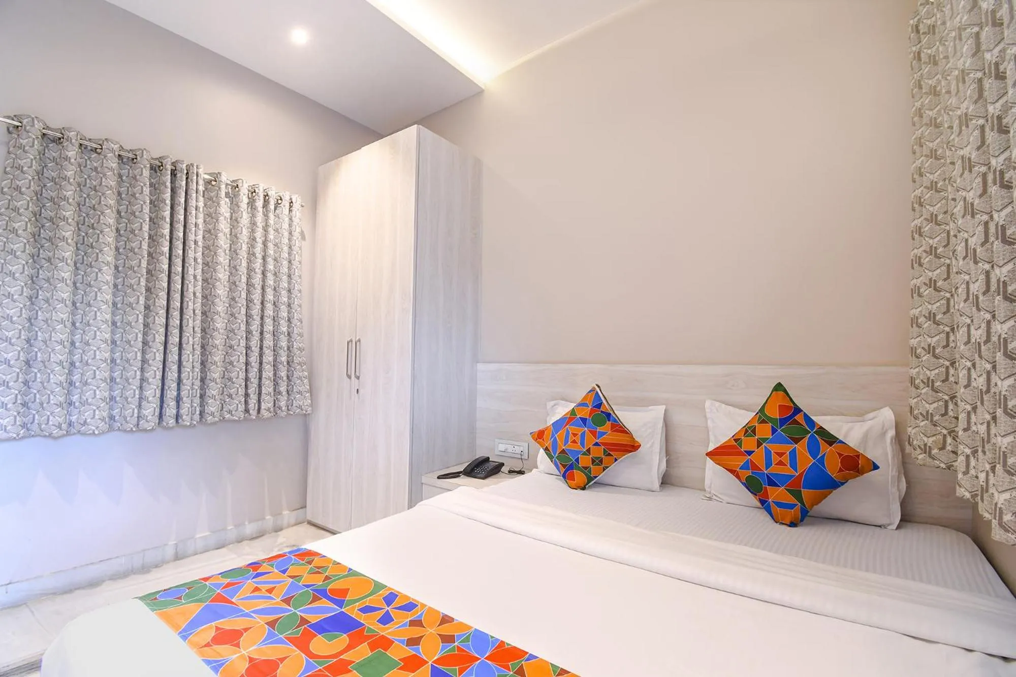 Bed in FabHotel Kitchen Q Inn - Belaghata