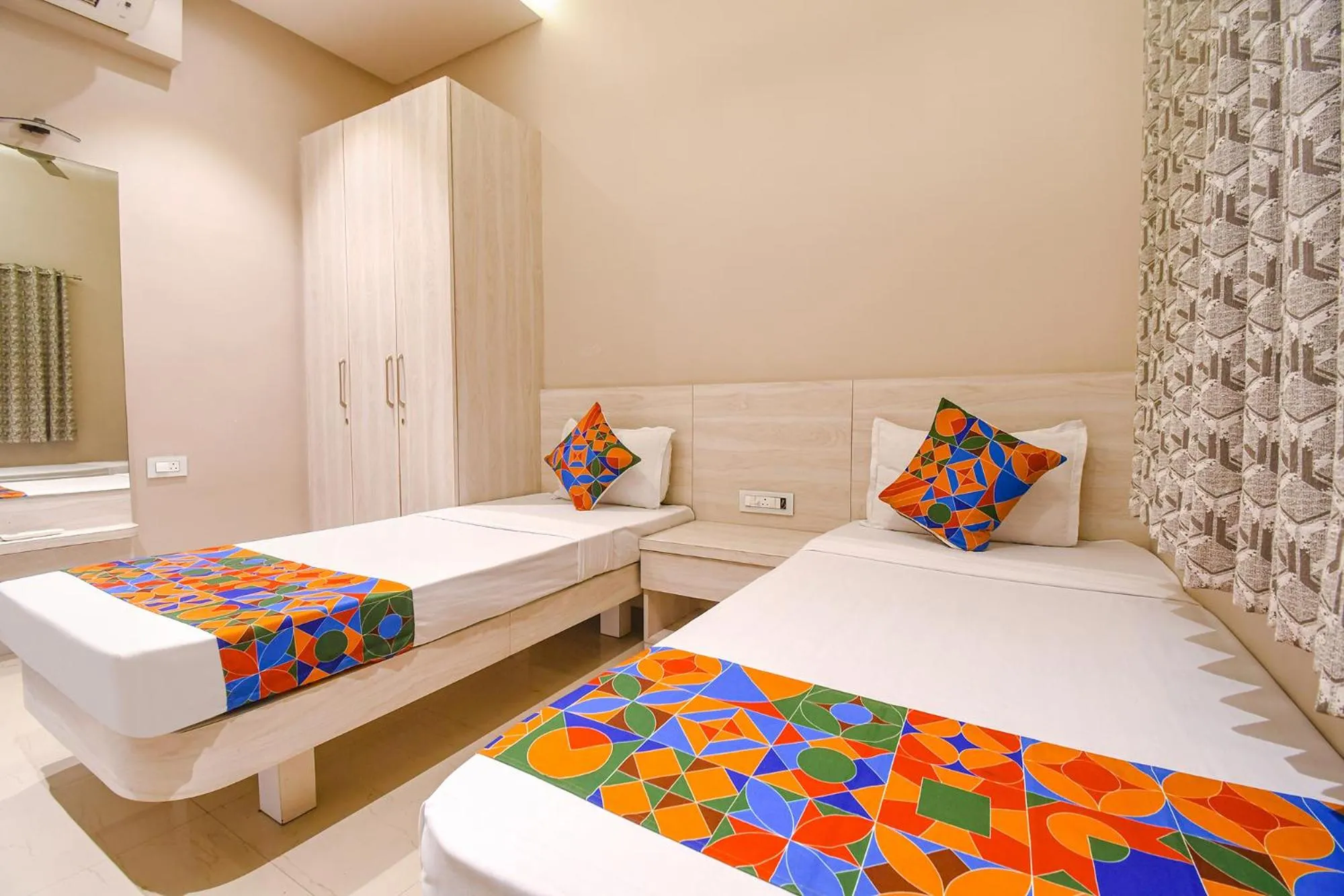 Bed in FabHotel Kitchen Q Inn - Belaghata