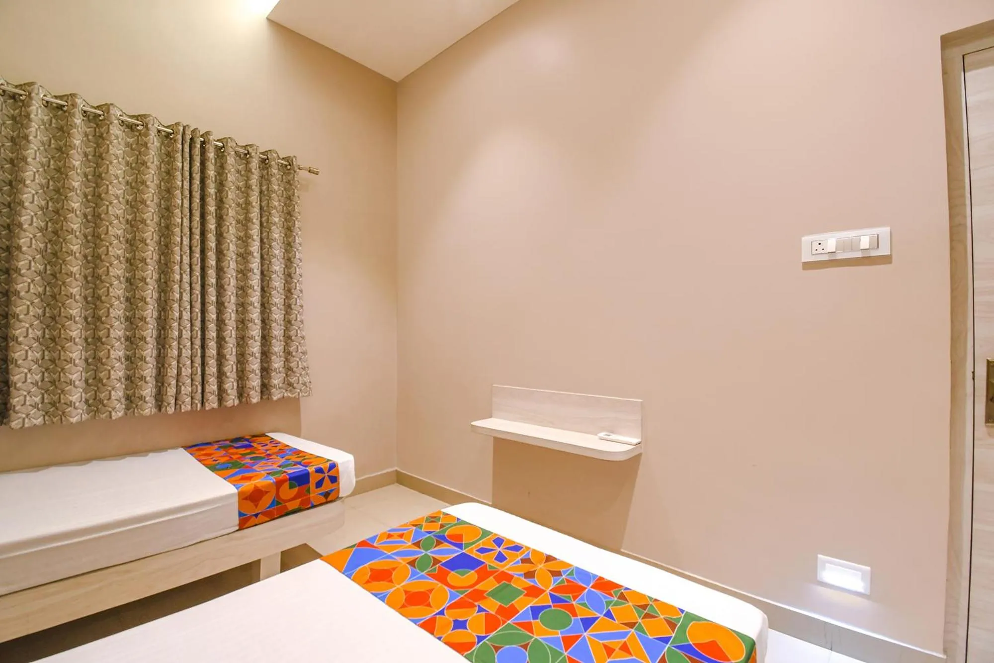 Bed in FabHotel Kitchen Q Inn - Belaghata