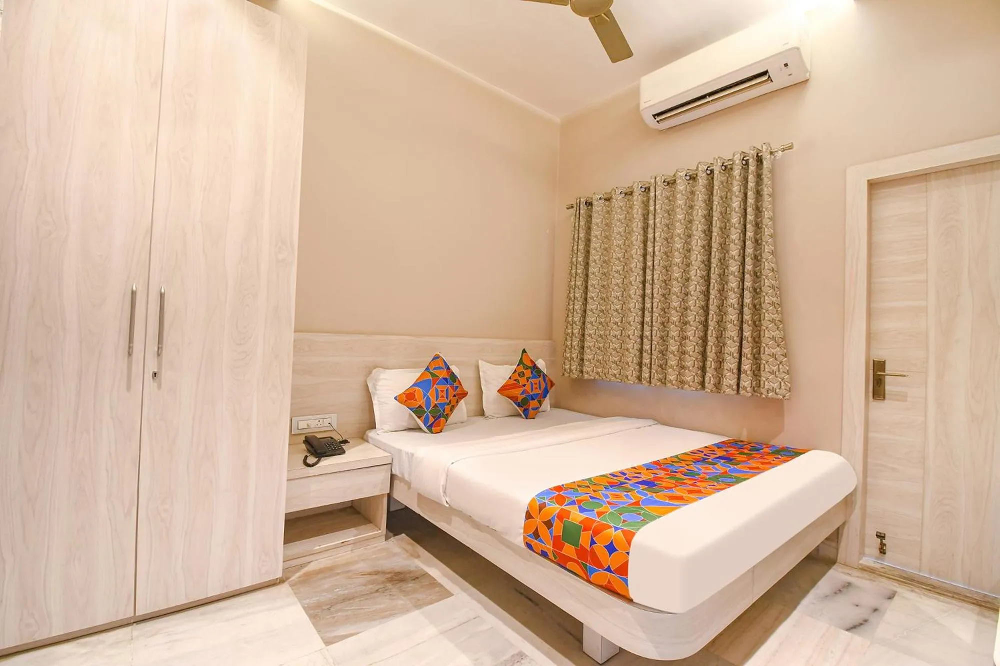 Bed in FabHotel Kitchen Q Inn - Belaghata