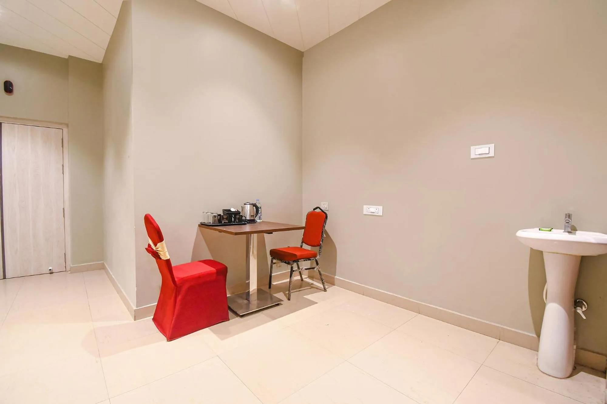 Seating area in FabHotel Kitchen Q Inn - Belaghata