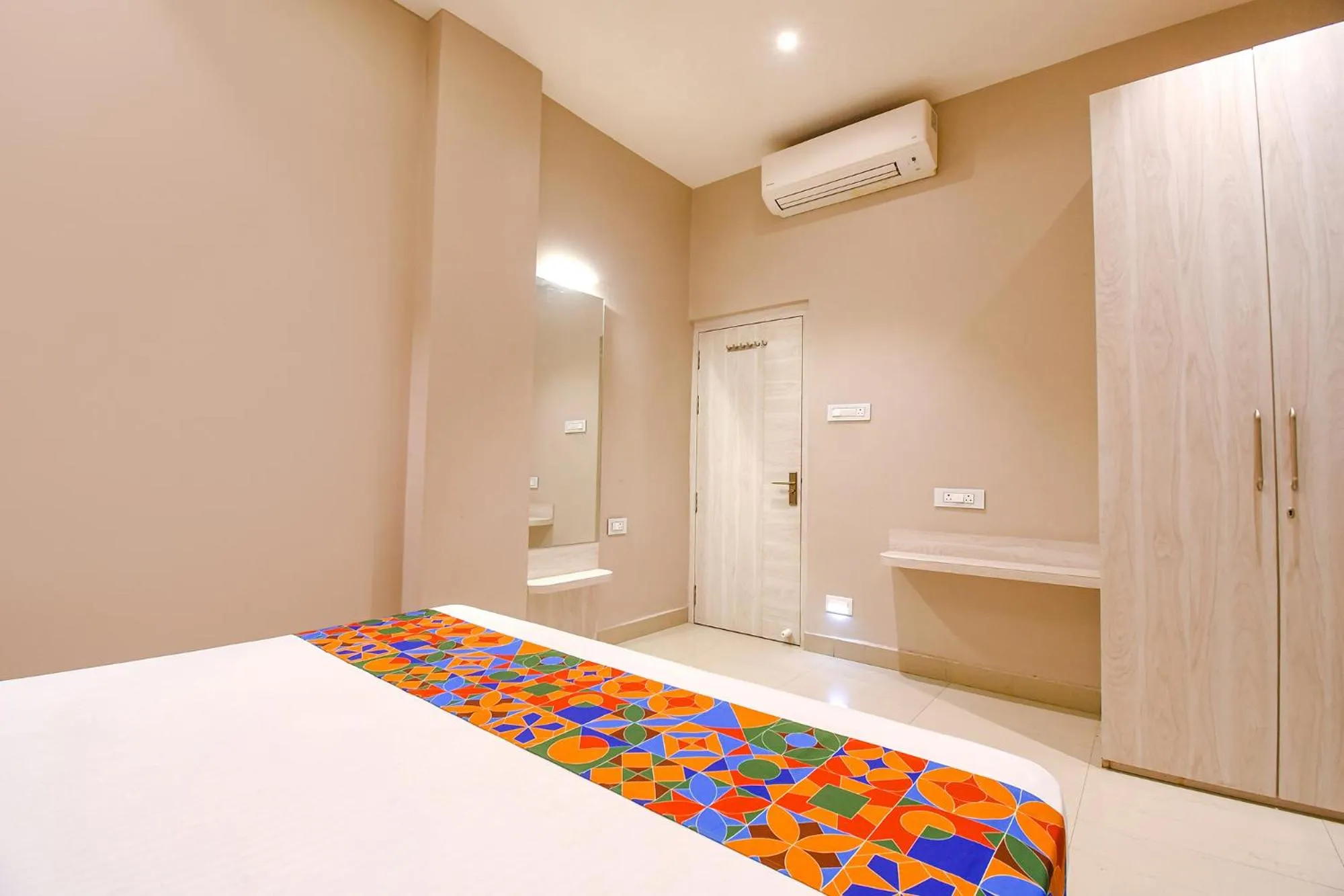 Bed in FabHotel Kitchen Q Inn - Belaghata