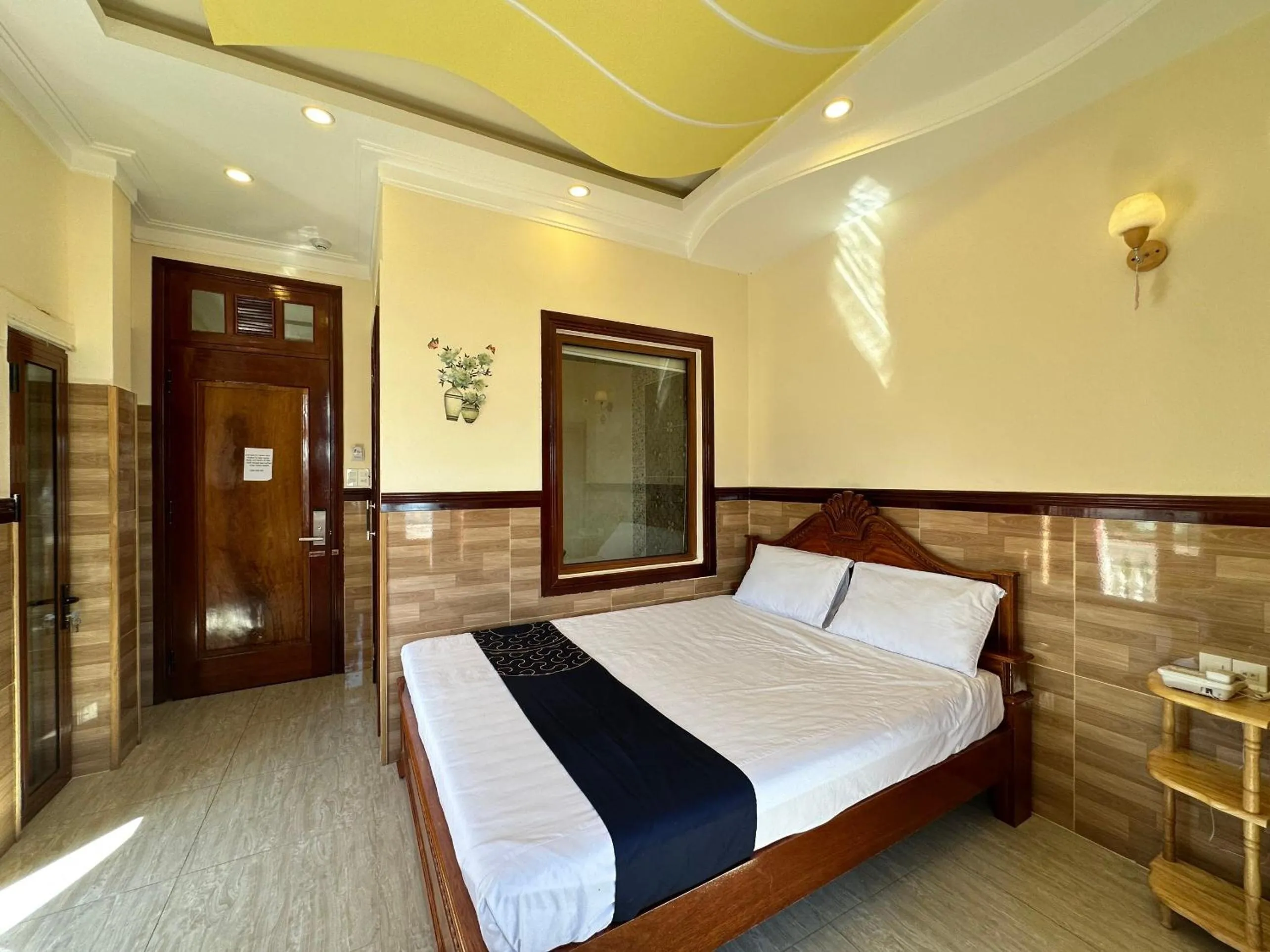 Bedroom, Bed in Capital O 1198 Dinh Loan Hotel