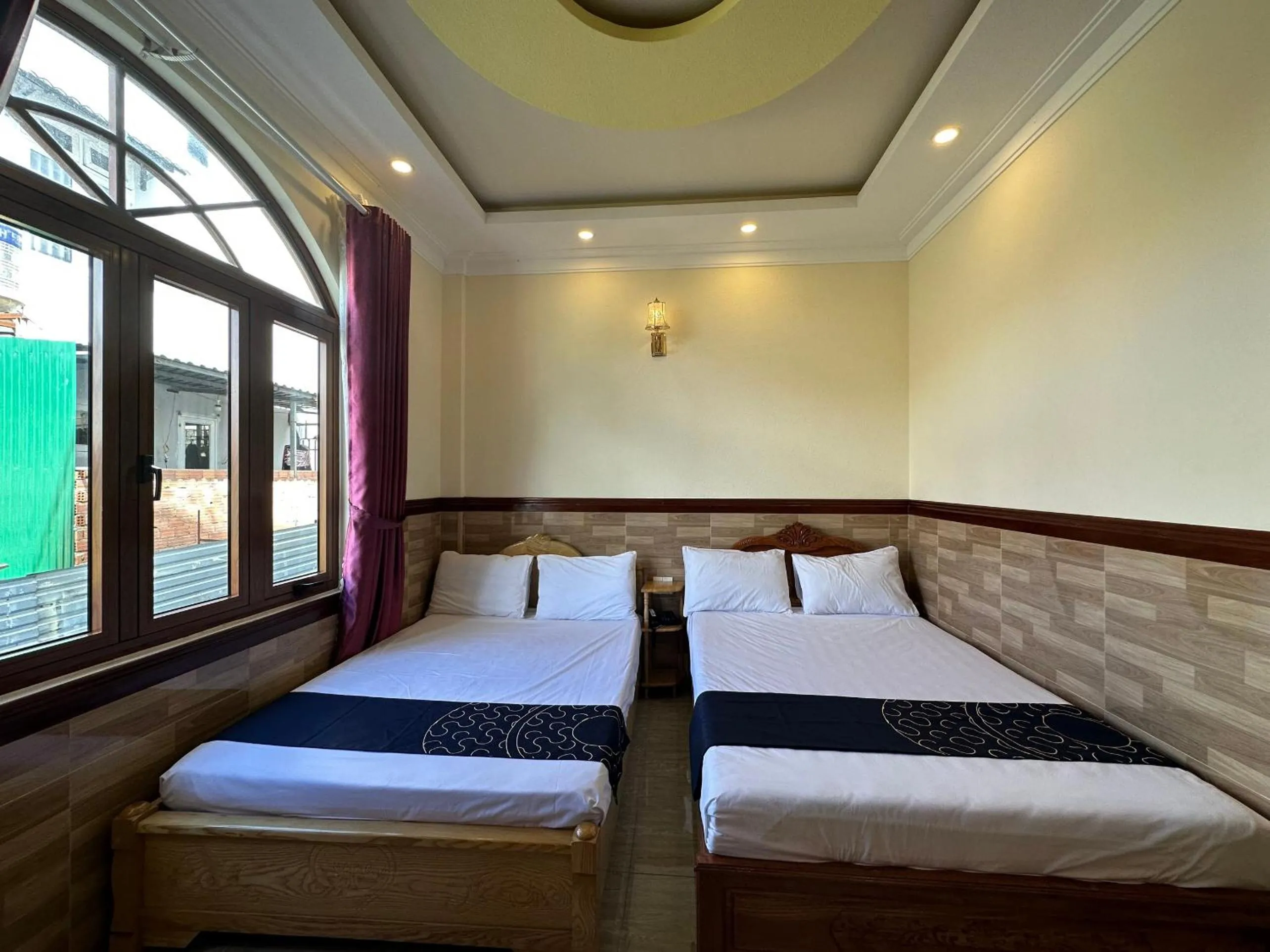 Bedroom, Bed in Capital O 1198 Dinh Loan Hotel