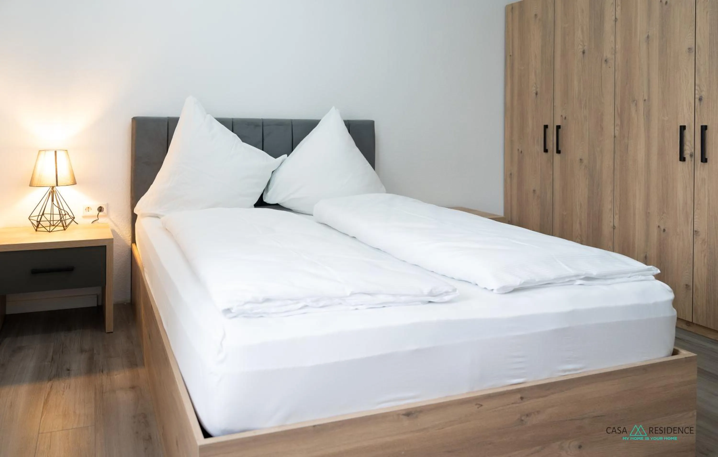 Bed in Louis Apartments