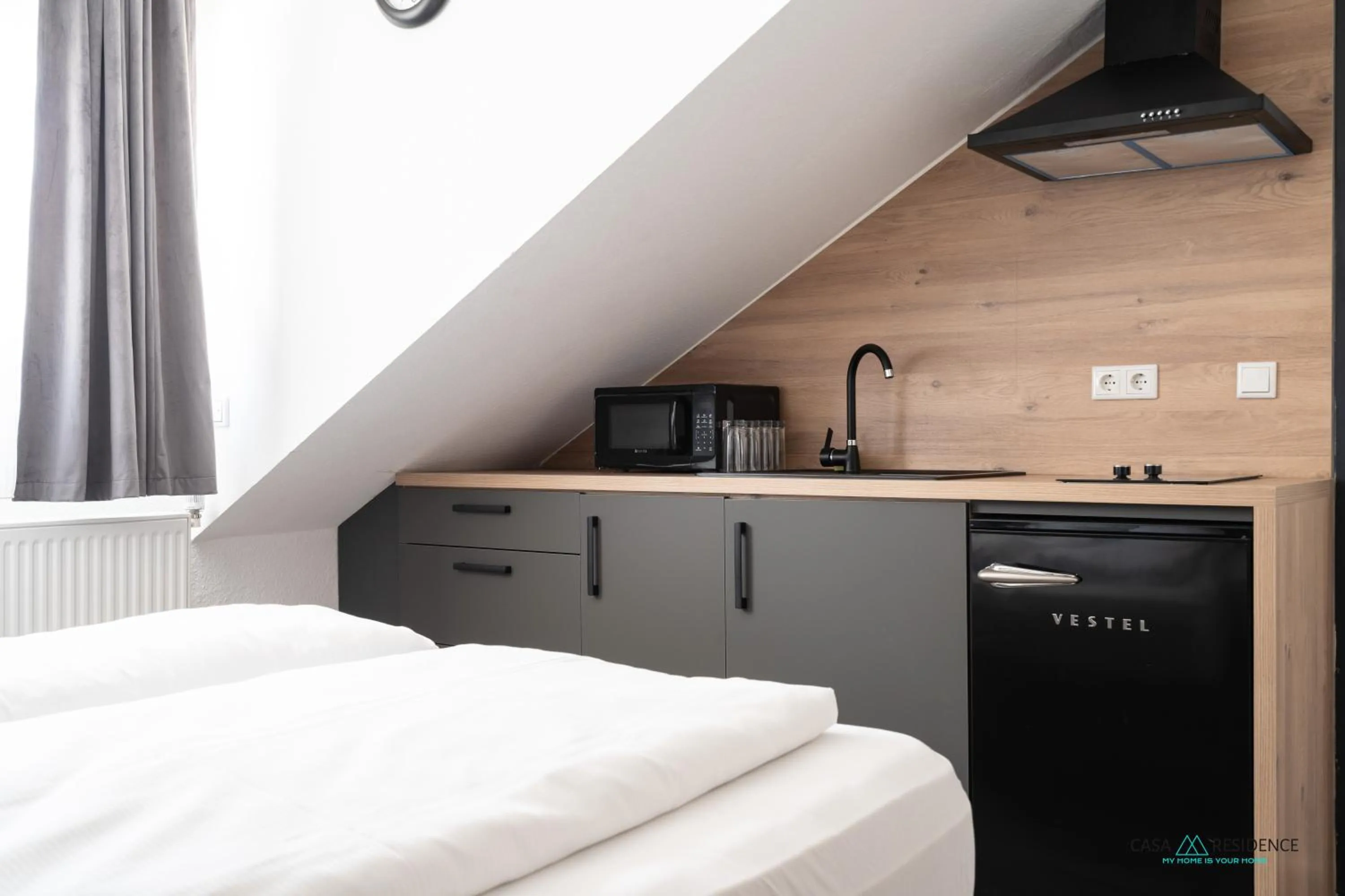 Bed in Louis Apartments