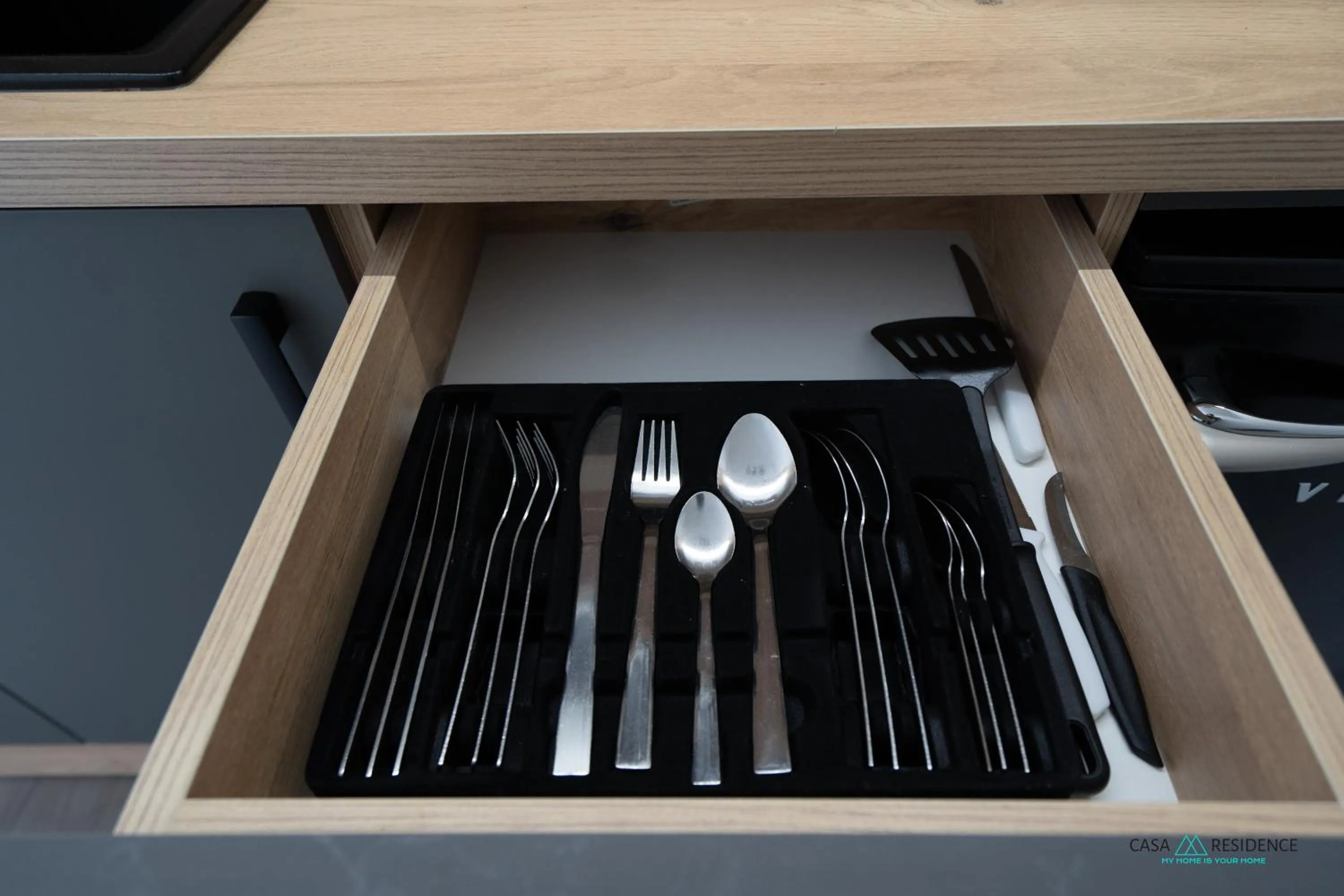 Kitchen or kitchenette in Louis Apartments