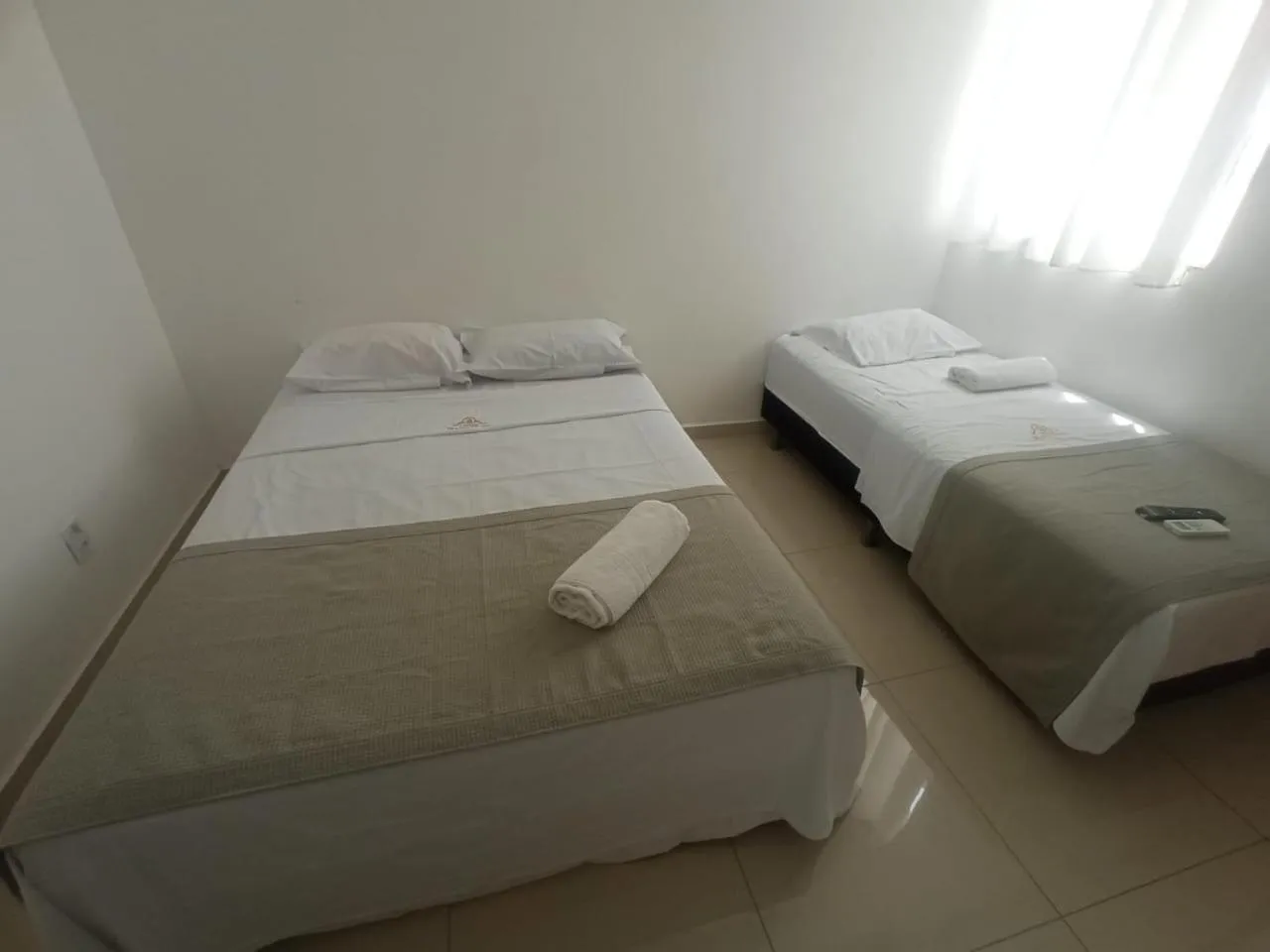 Bed in Central Palace Hotel