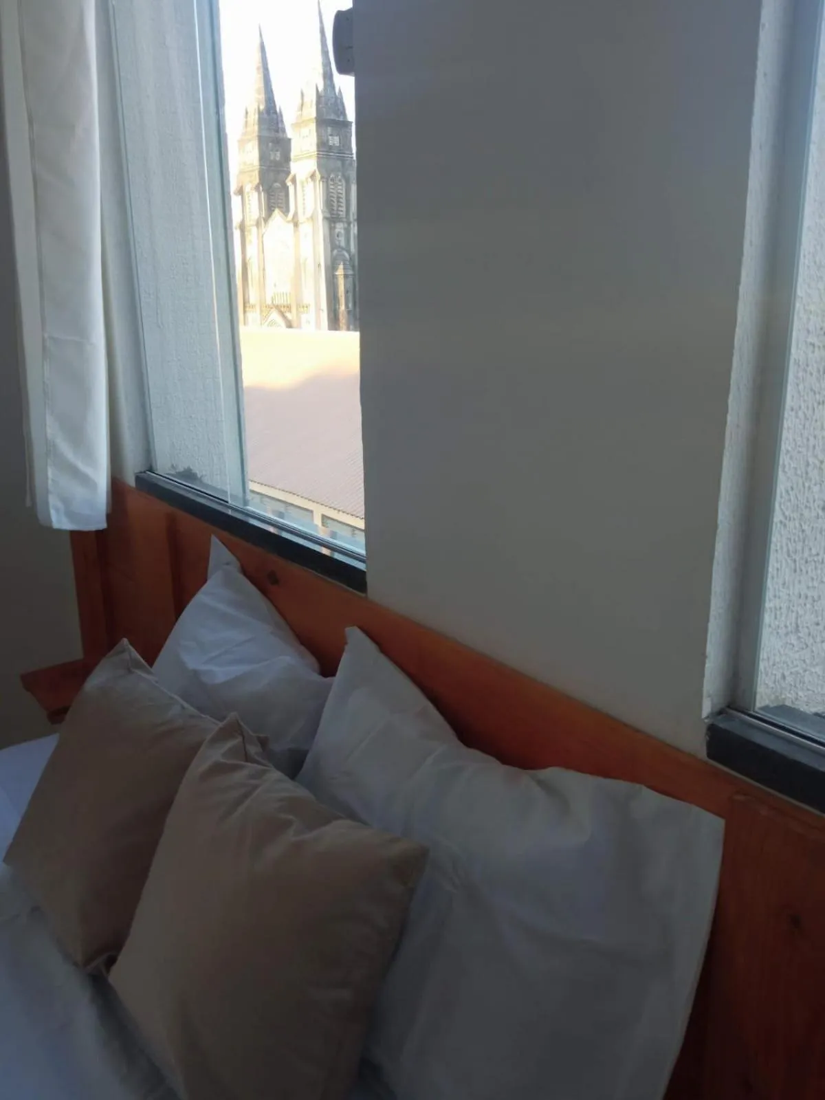 Bed in Central Palace Hotel