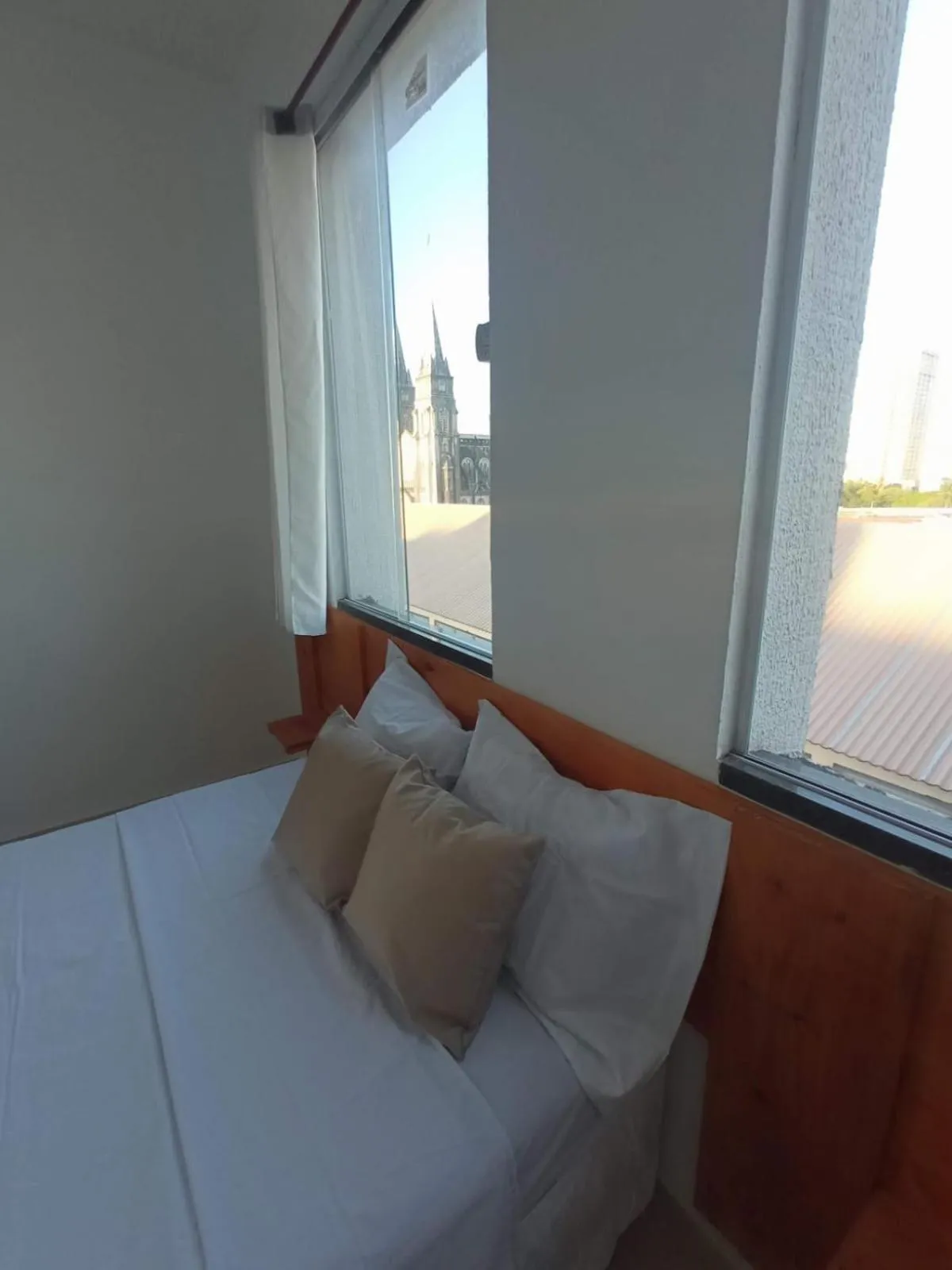 Bed in Central Palace Hotel