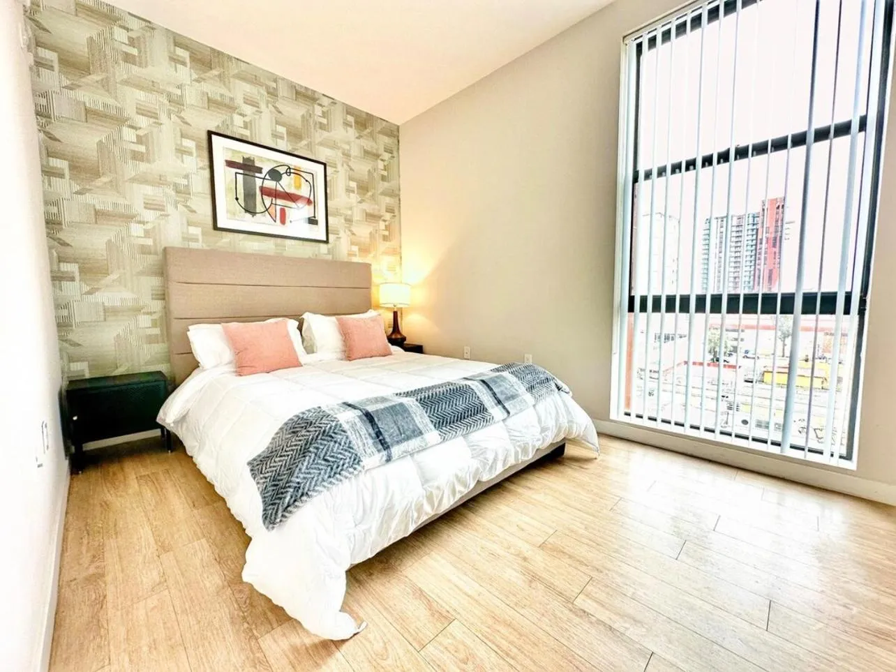 Bed in One Bedroom Apartment Wbalcony And City Views!