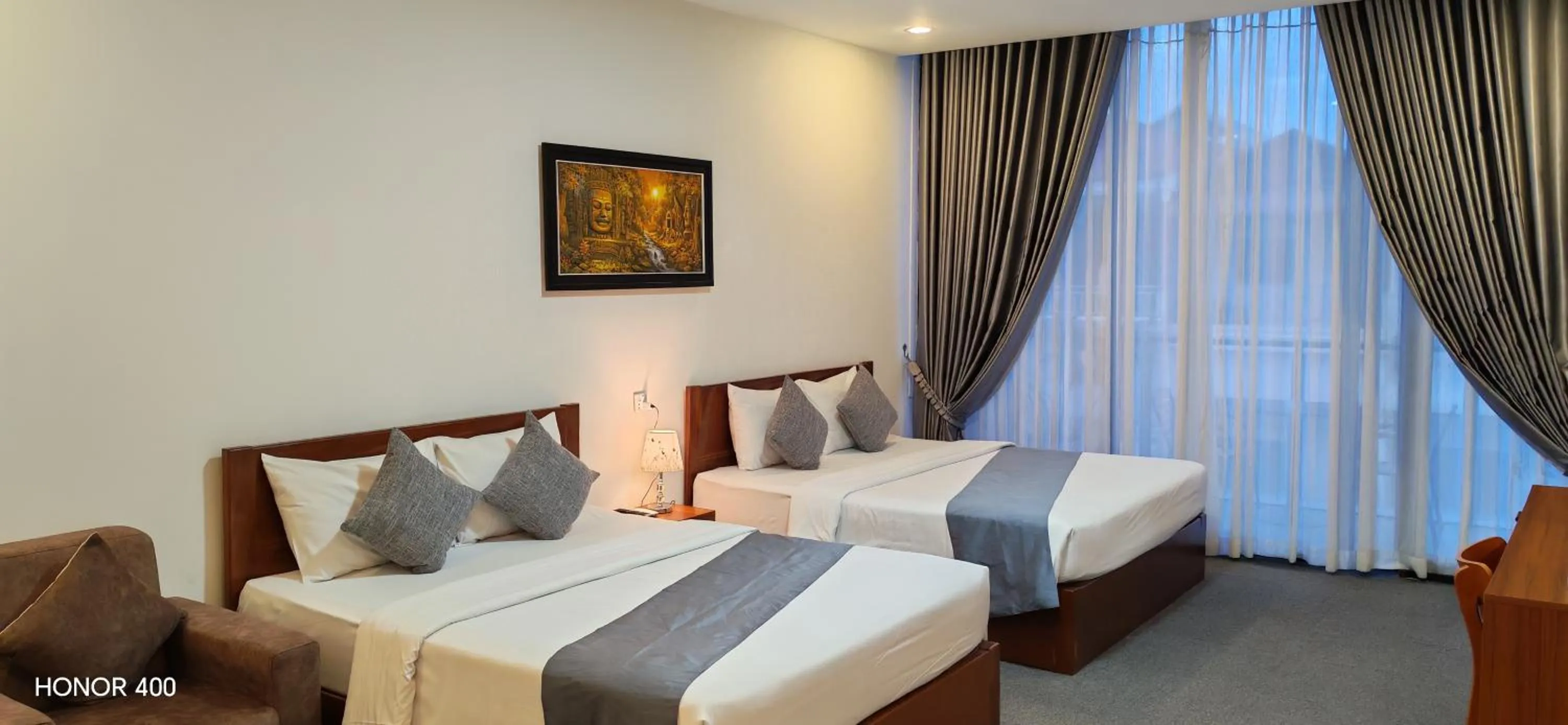 Photo of the whole room, Bed in Nimith Hotel & Restaurant