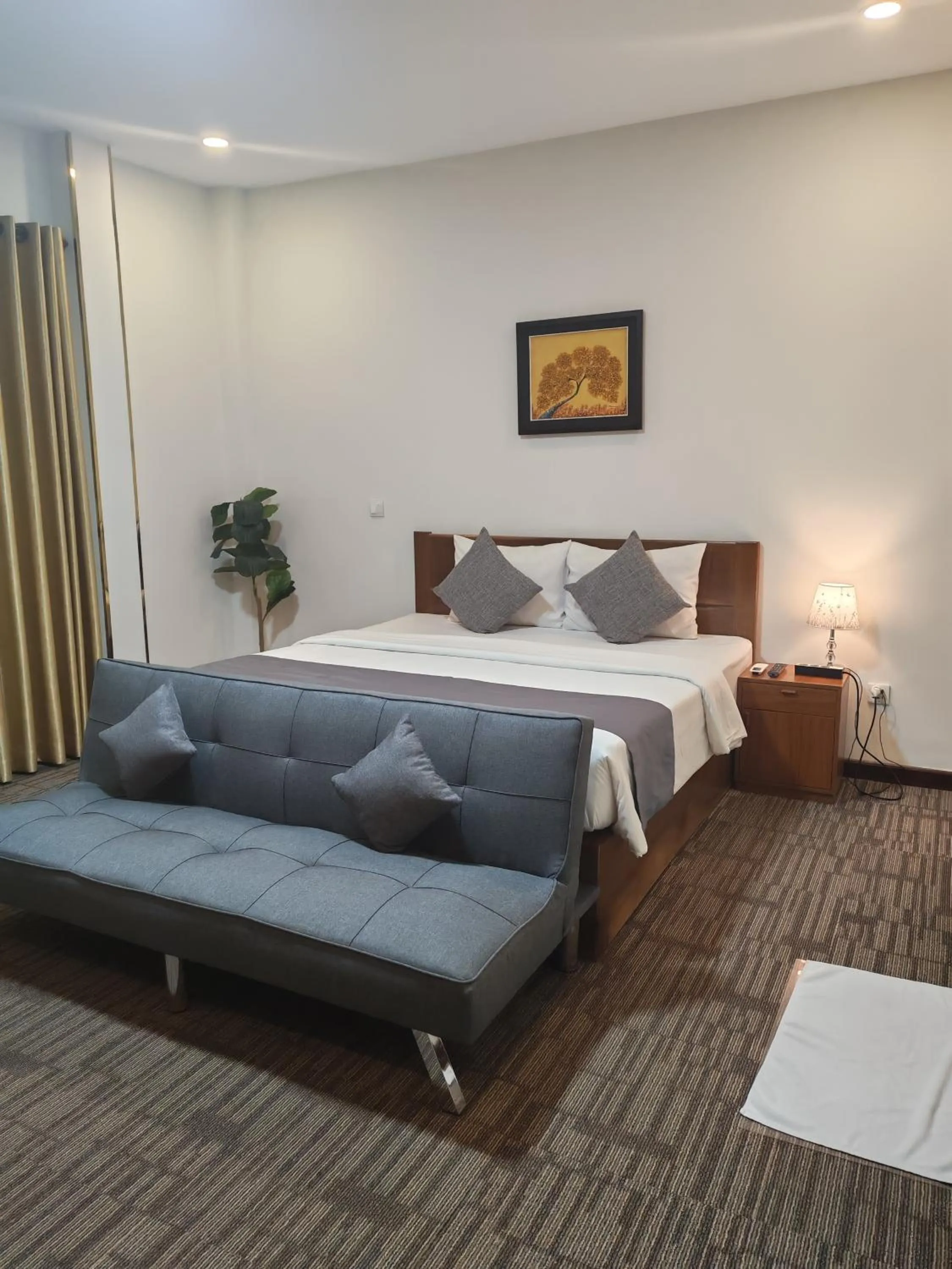 Photo of the whole room, Bed in Nimith Hotel & Restaurant