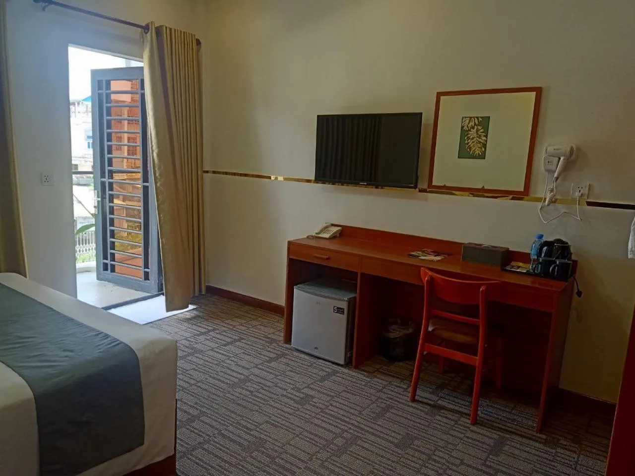 Photo of the whole room, Bed in Nimith Hotel & Restaurant