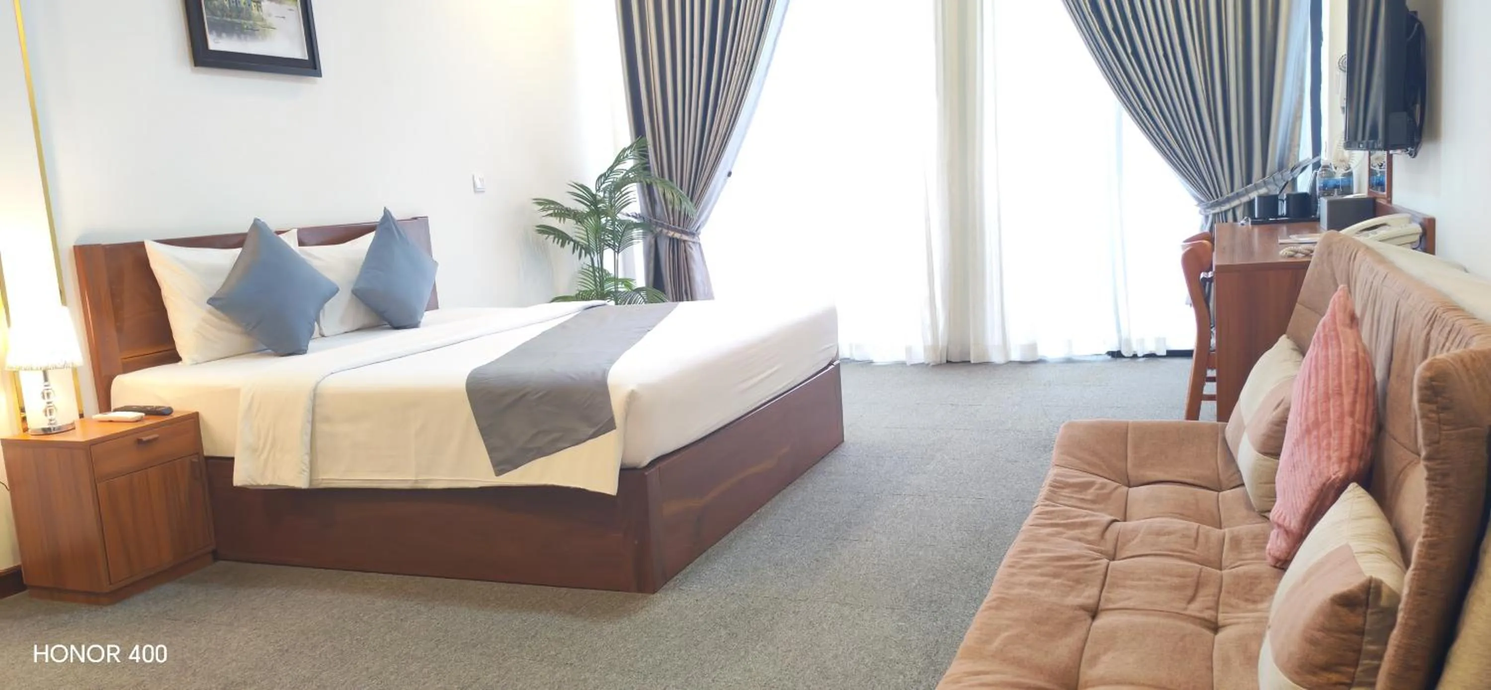 Photo of the whole room, Bed in Nimith Hotel & Restaurant