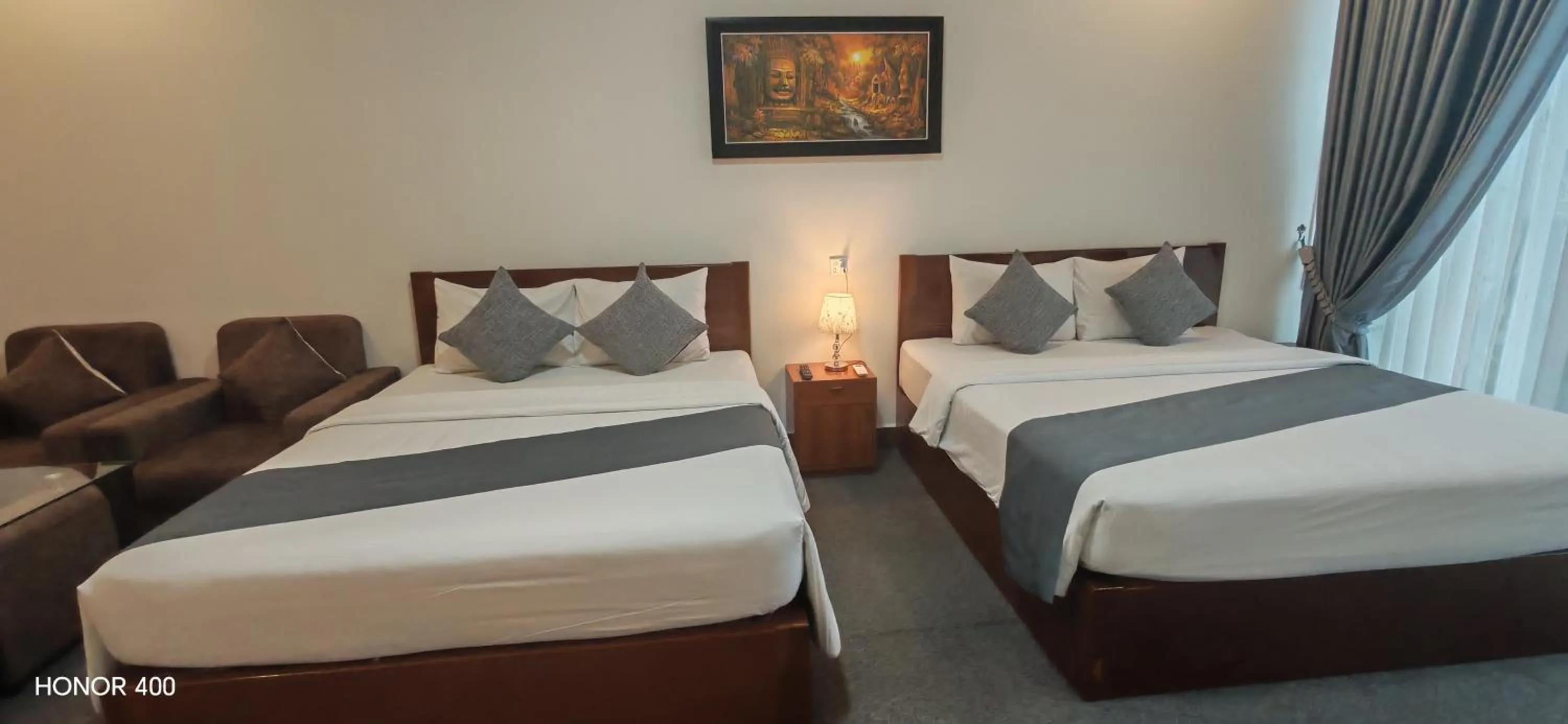 Photo of the whole room, Bed in Nimith Hotel & Restaurant