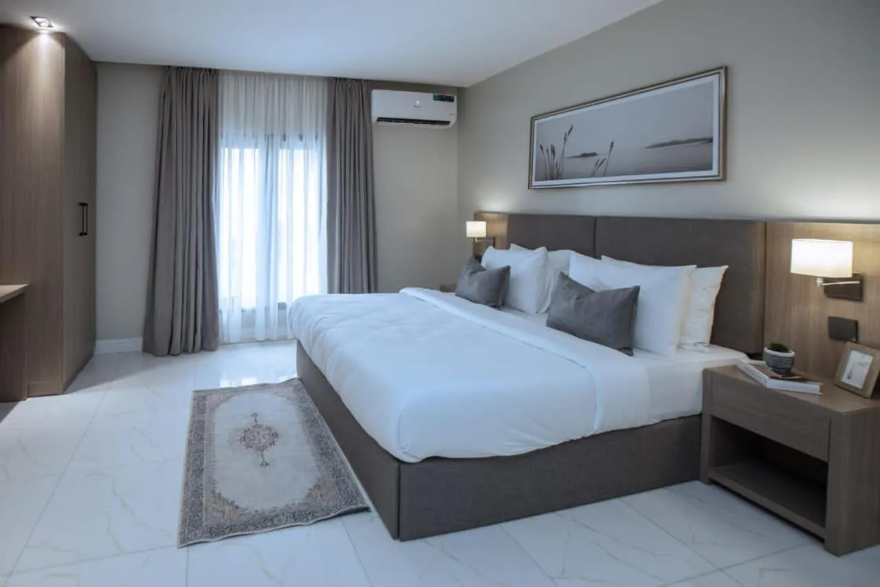 Bed in Knightsbridge Hotel & Suites