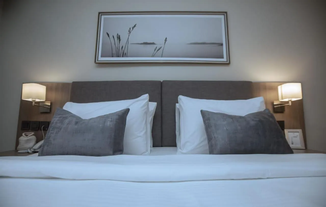 Bed in Knightsbridge Hotel & Suites