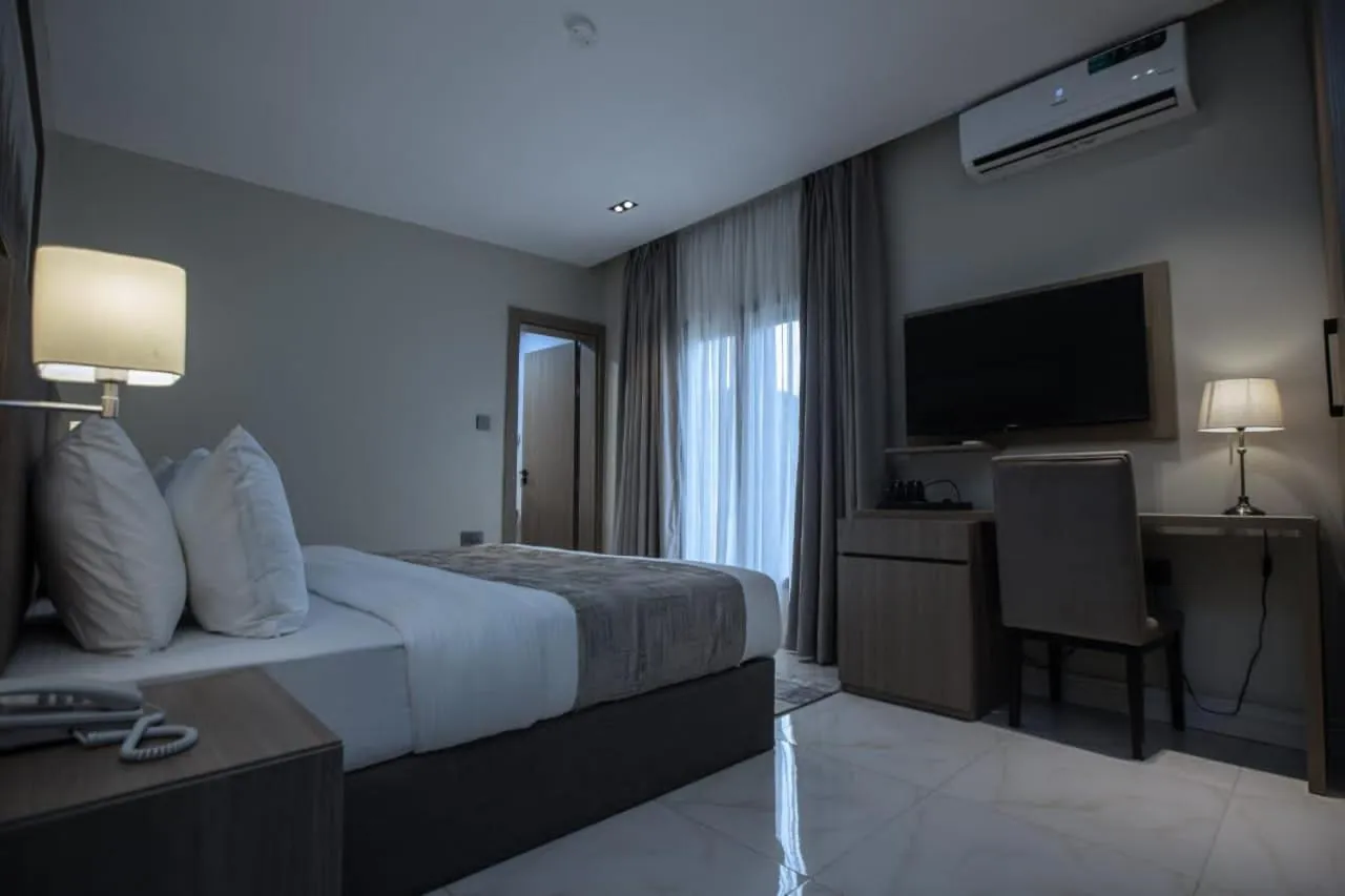 Bed in Knightsbridge Hotel & Suites