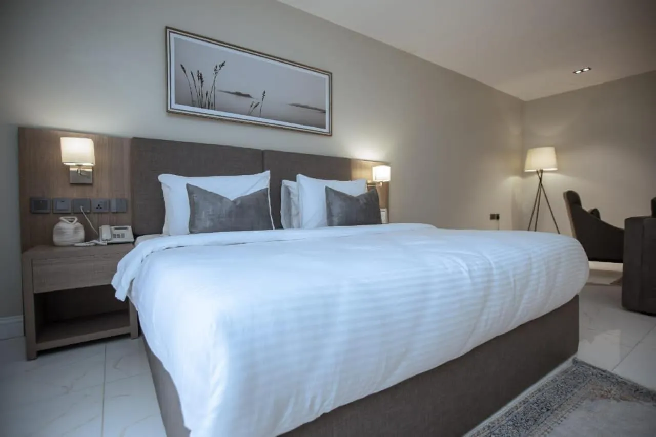 Bed in Knightsbridge Hotel & Suites