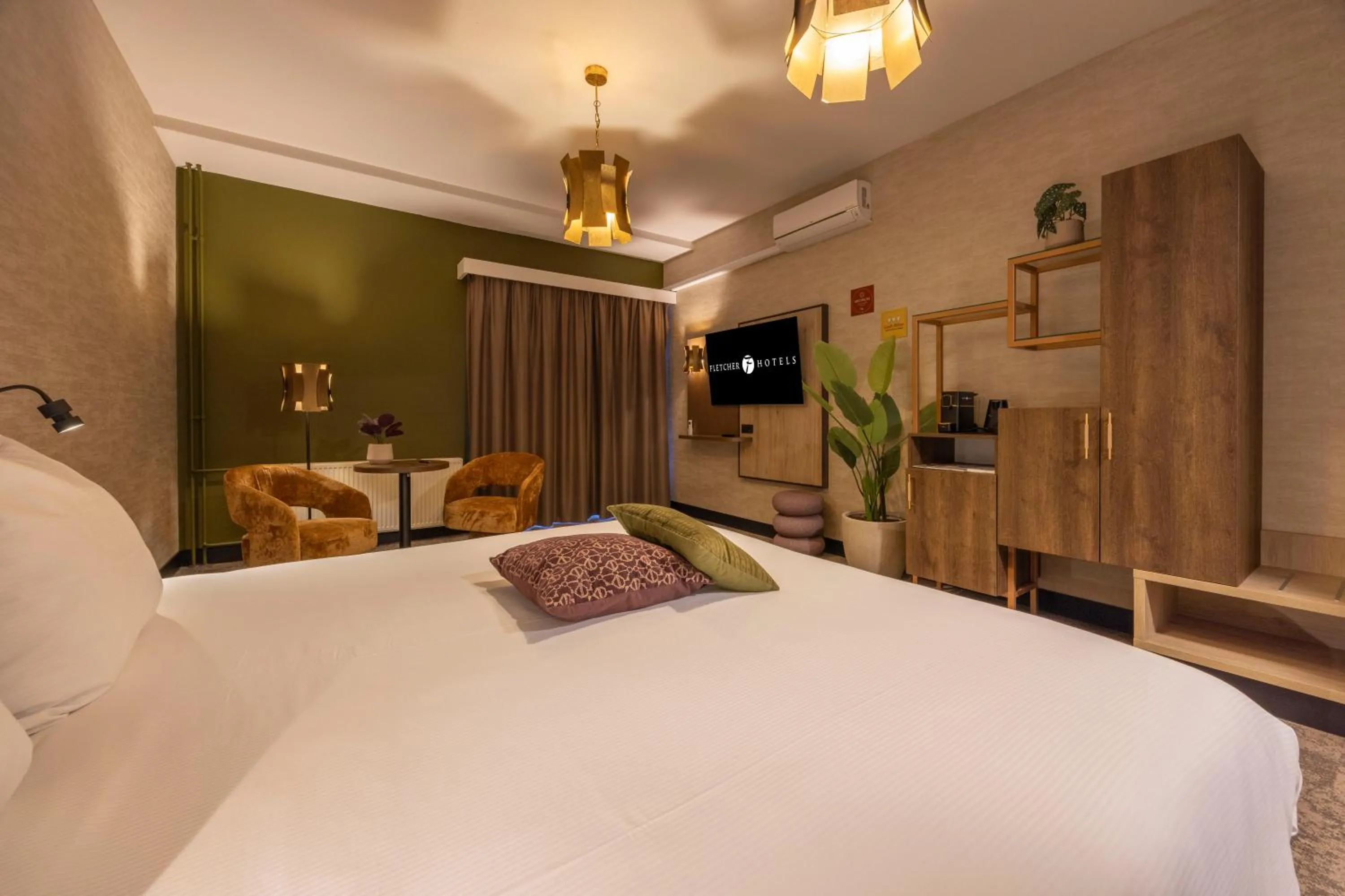 Bed in Fletcher Hotel-Restaurant Klein Zwitserland