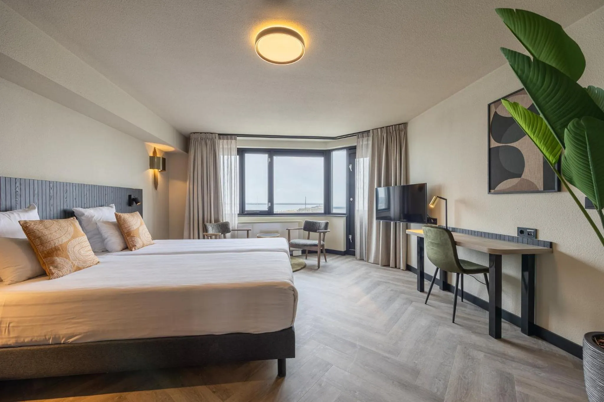 Photo of the whole room, Bed in Leonardo Hotel IJmuiden Seaport Beach