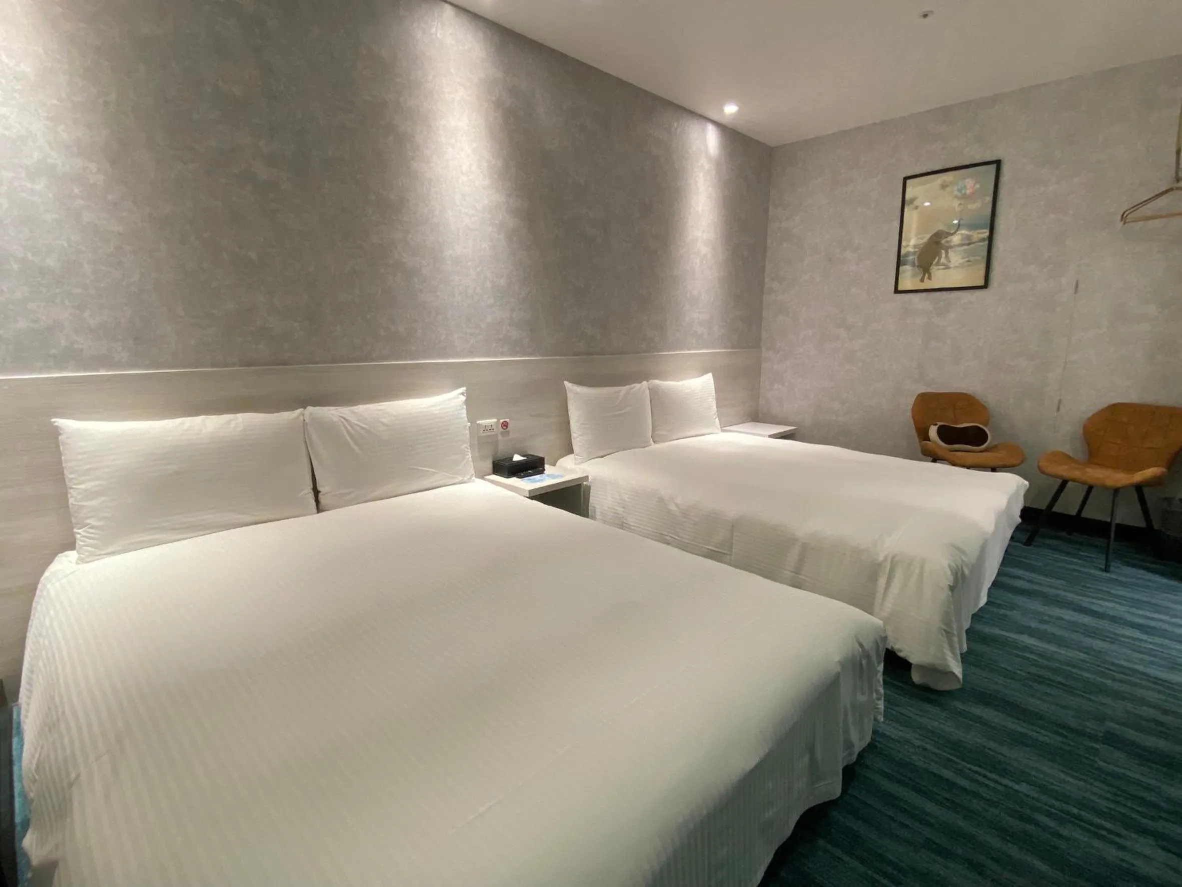Bed in 西門雲町旅店 Sky Gate Hotel