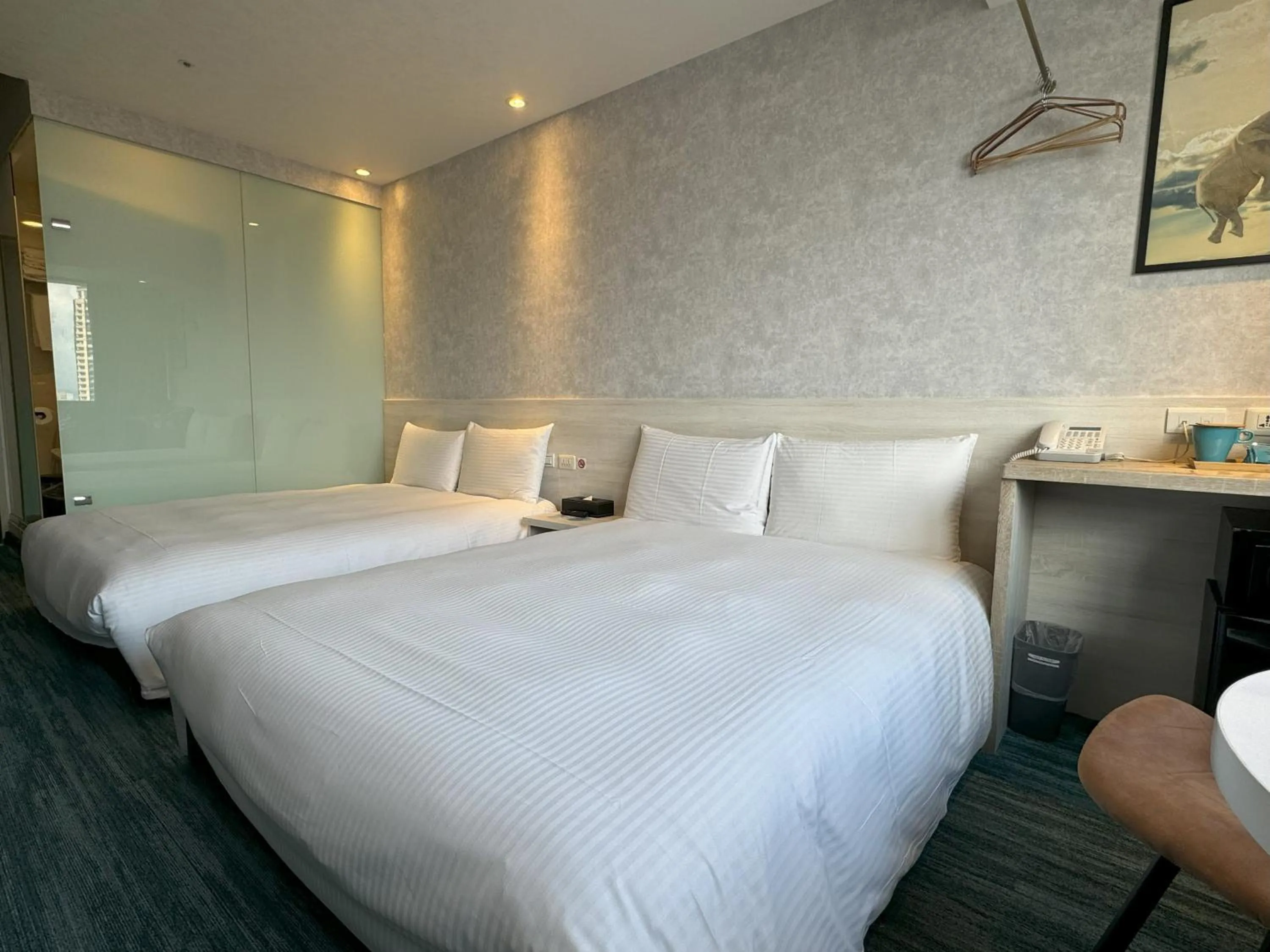 Bed in 西門雲町旅店 Sky Gate Hotel