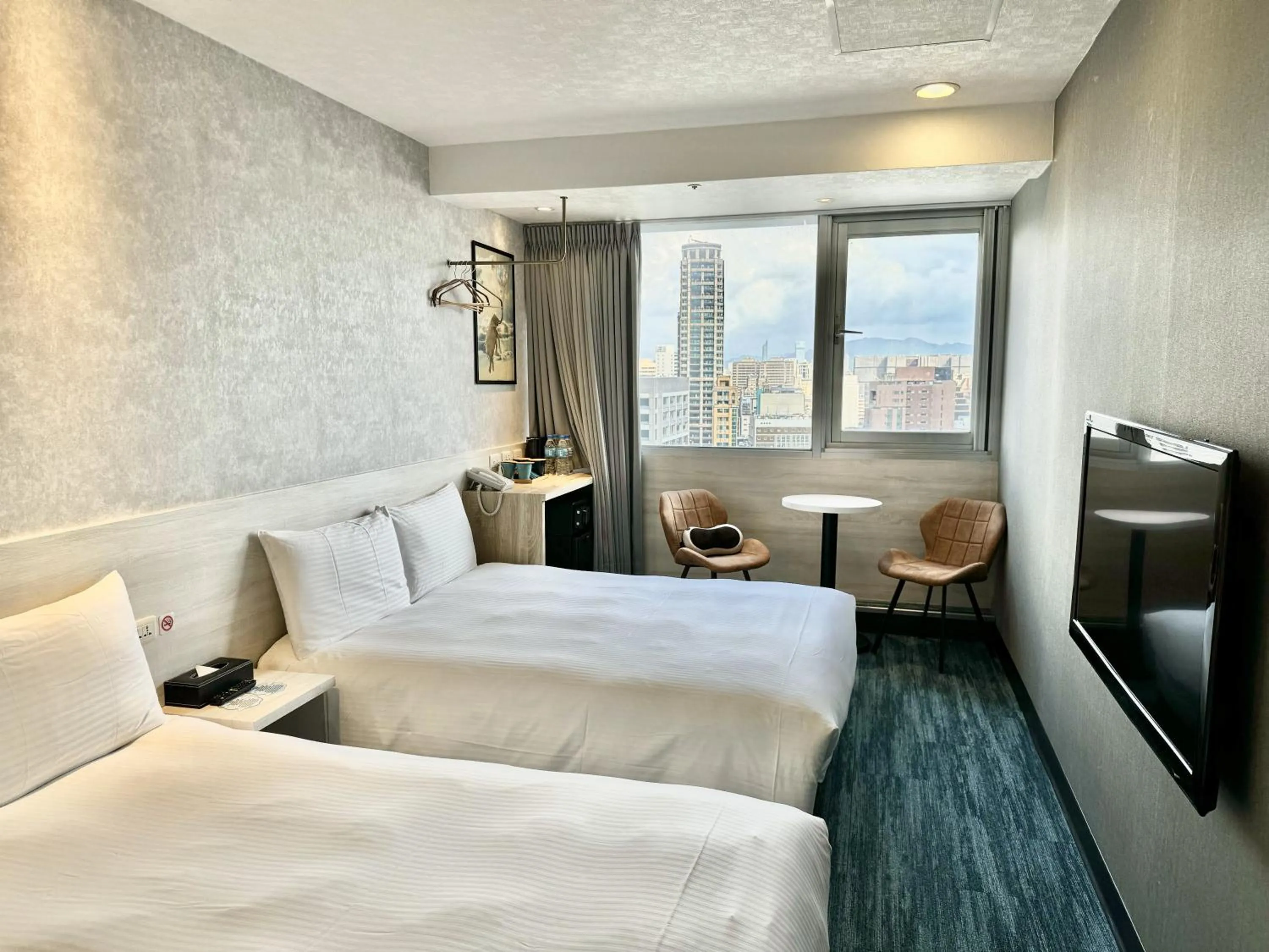 Bed in 西門雲町旅店 Sky Gate Hotel